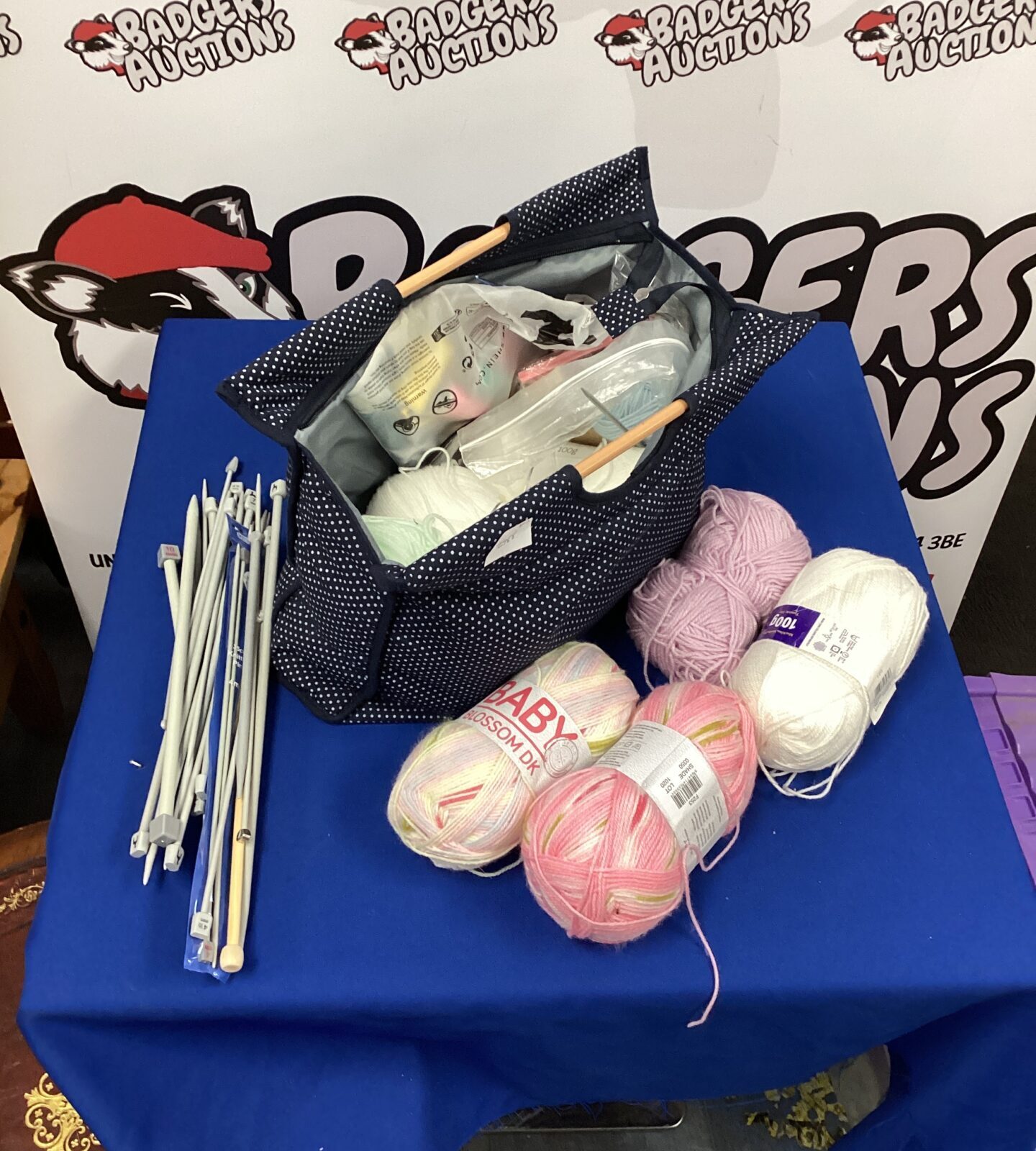 Bag of knitting wool with knitting needles