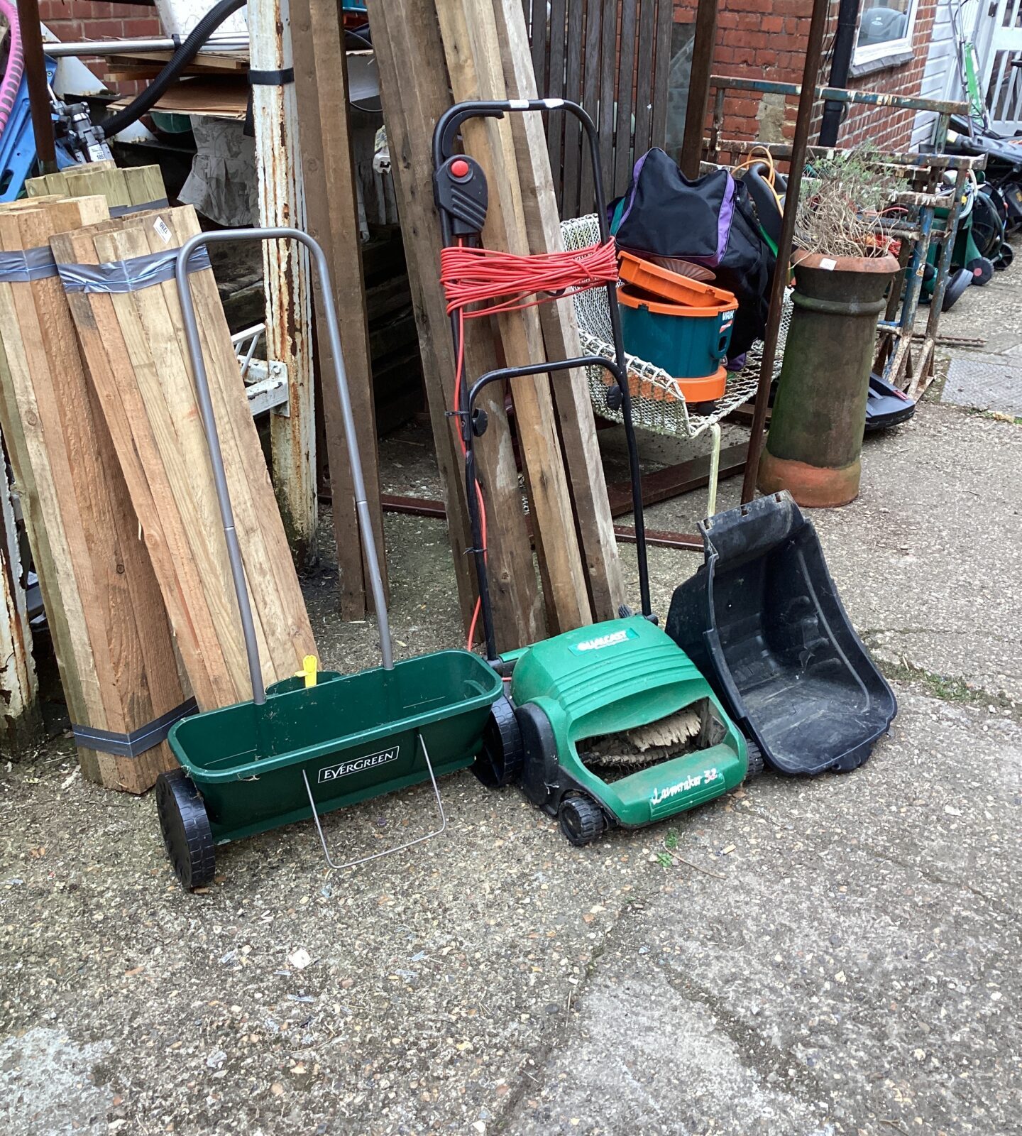 Qualcast lawnraker with seeder