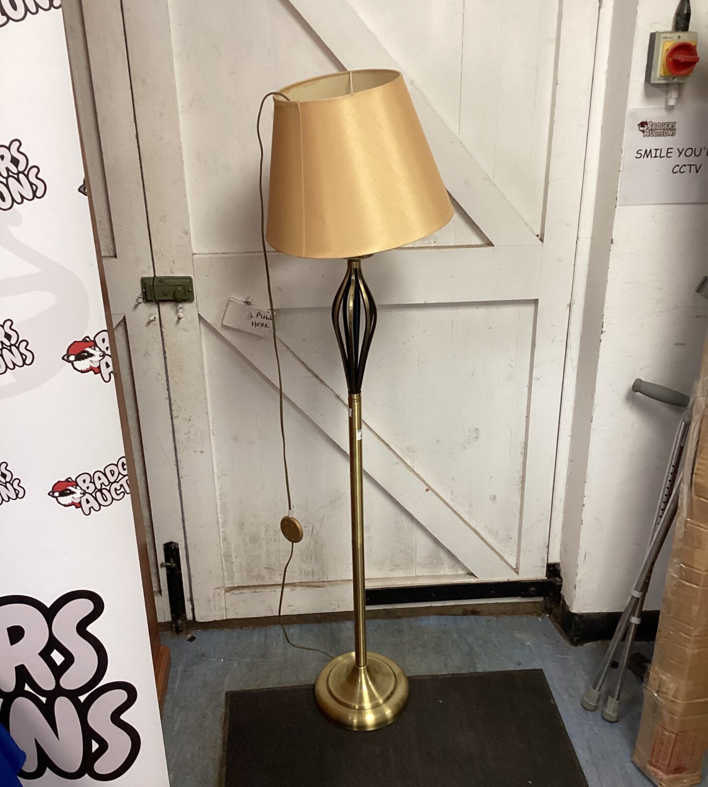 Brass standard lamp with shade