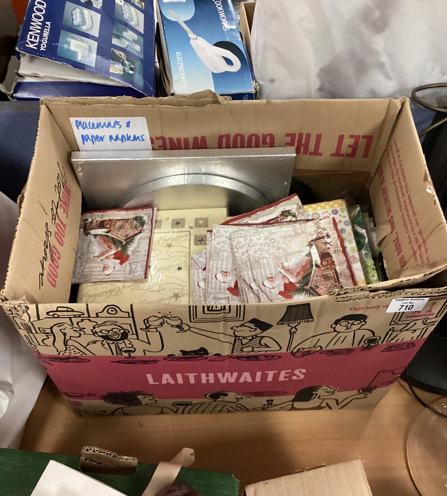 Box of Christmas themed napkins & cake stands