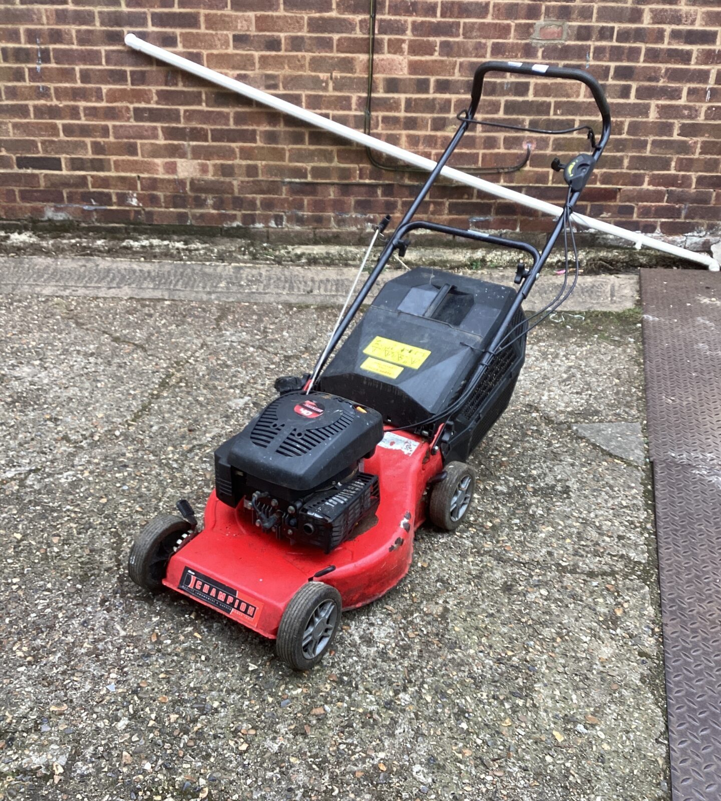Champion petrol lawn mower