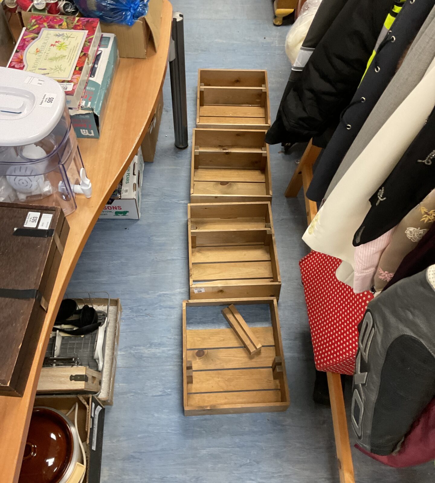 Four wooden storage crates