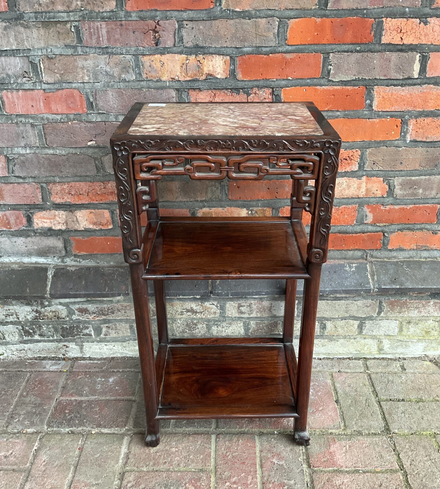 Chinese hardwood two tier occasional table with inset marble top & carved frame