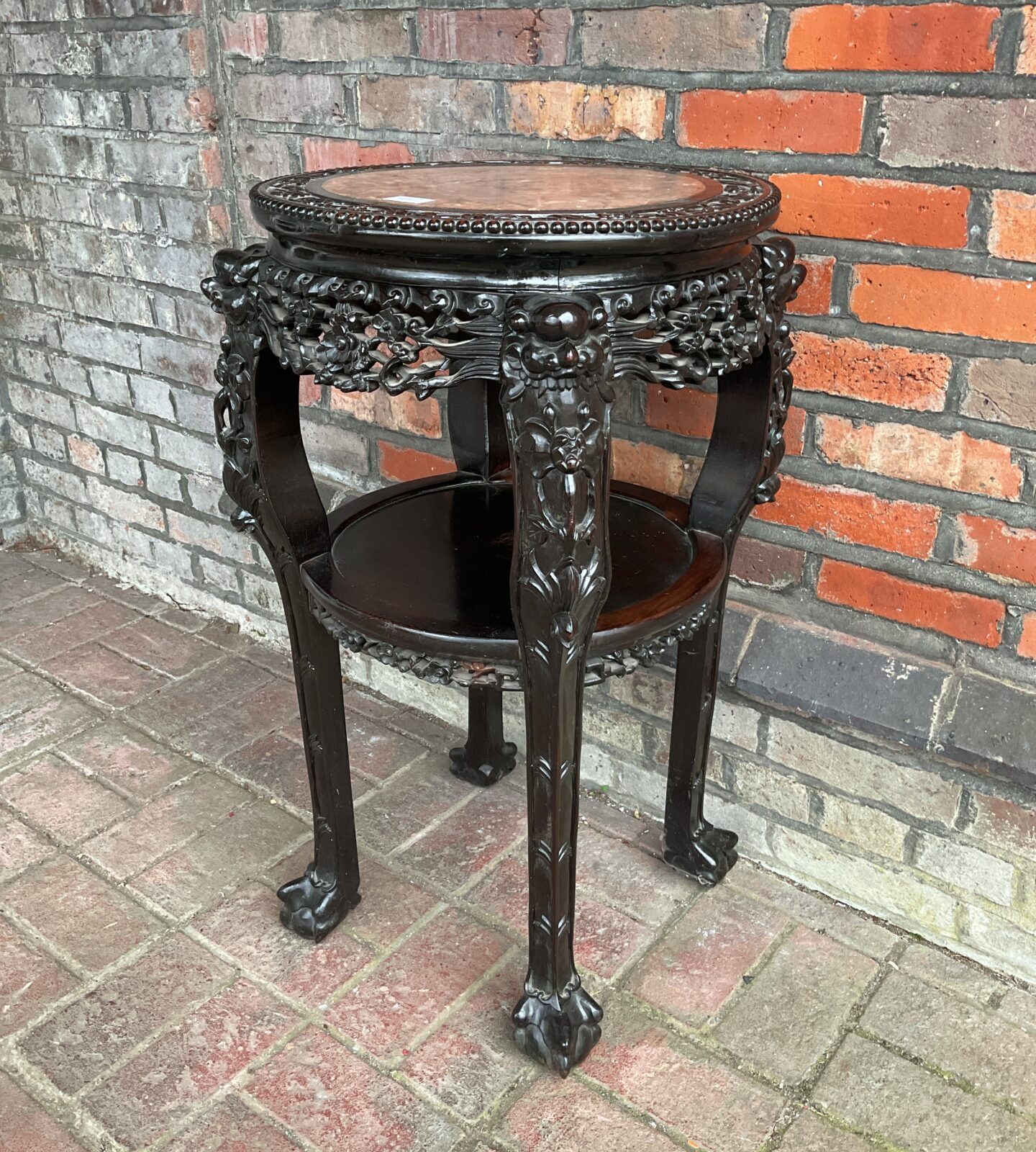 Chinese hardwood two tier circular occasional table with inset marble top with heavily carved frame - Image 3