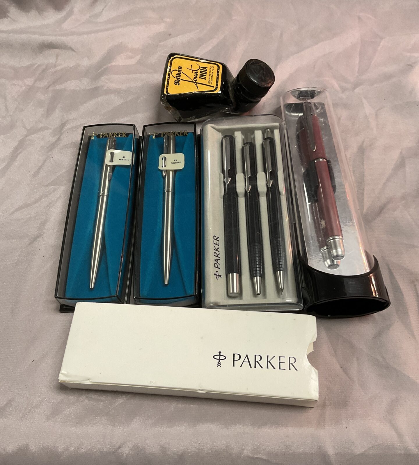Six New Parker pens and Bottle of vintage pelican Indian ink