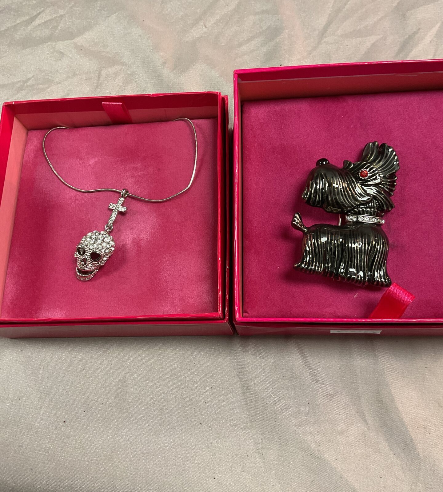 Butler and Wilson  large Scottie dog brooch and skull pendant Necklace