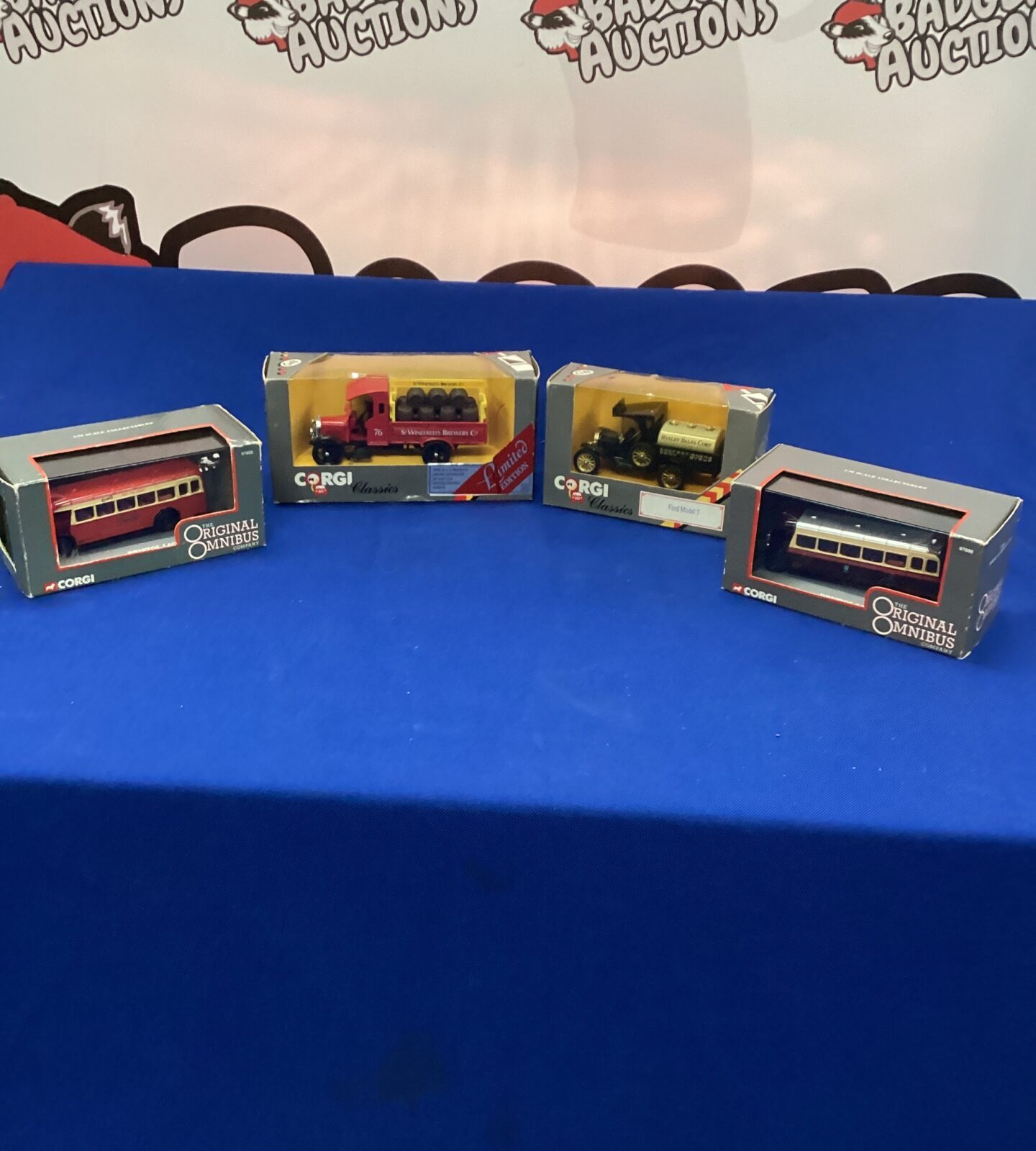 Four Corgi Die Cast model cars in boxes