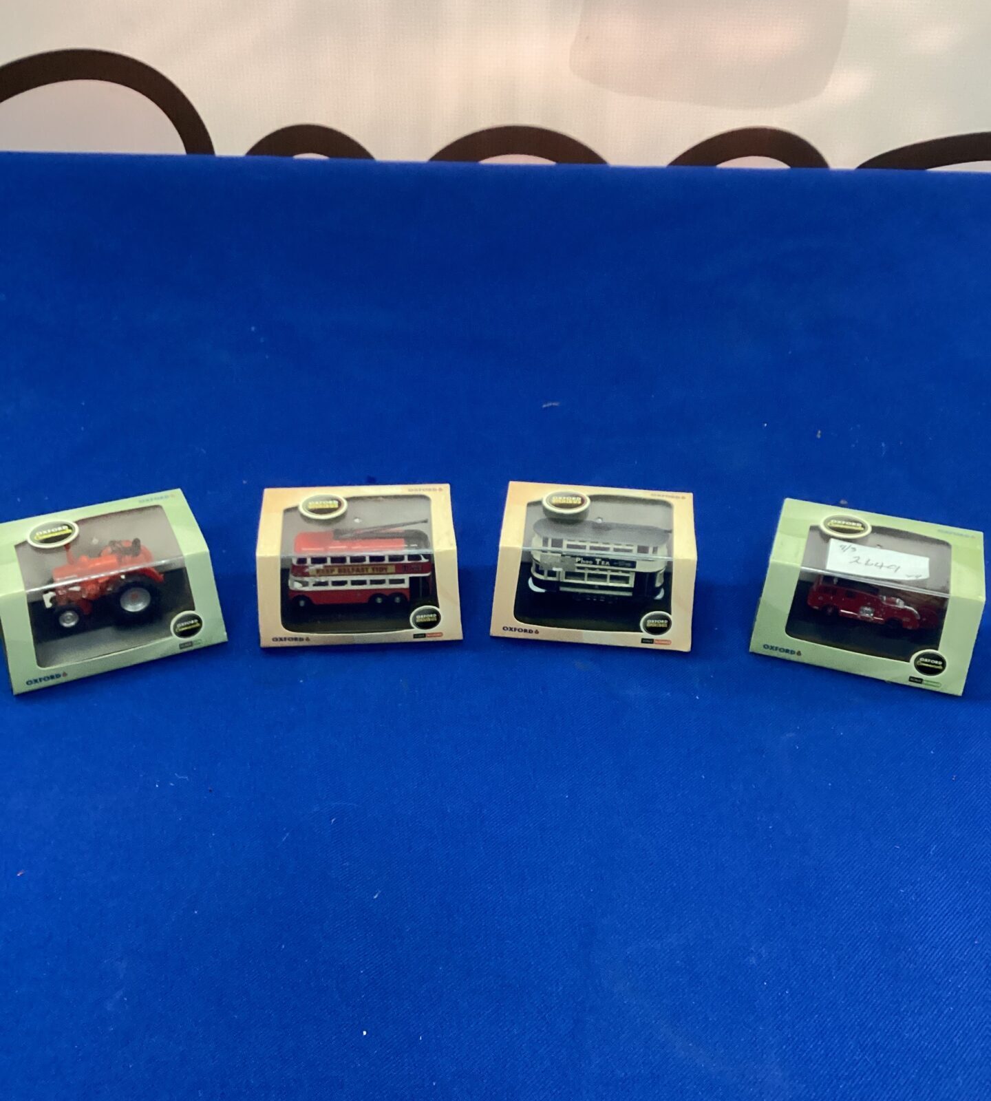 Four Oxford Model mini cars in boxes