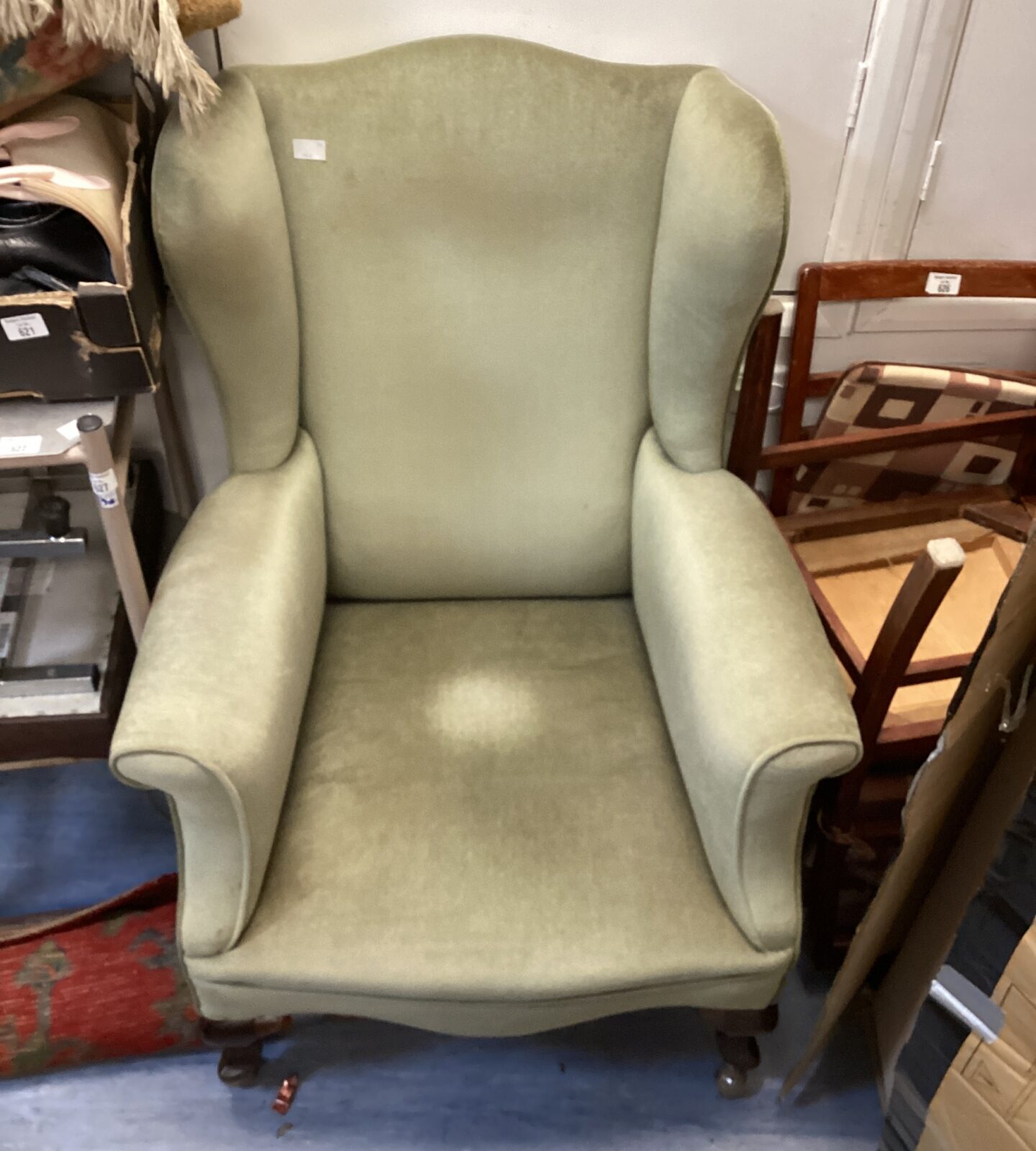 Vintage wingback chair on casters