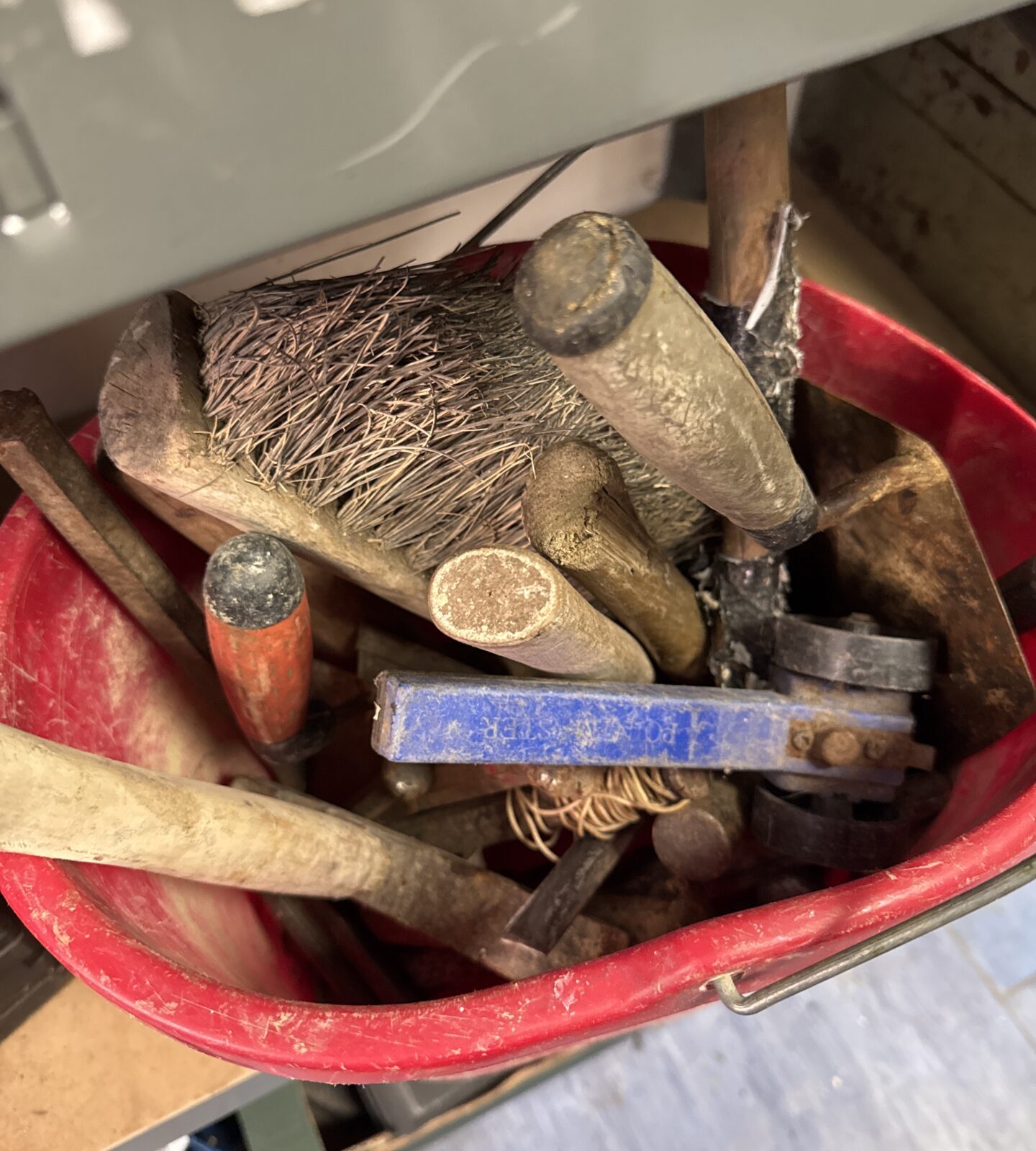 Bucket of bricklayers tools