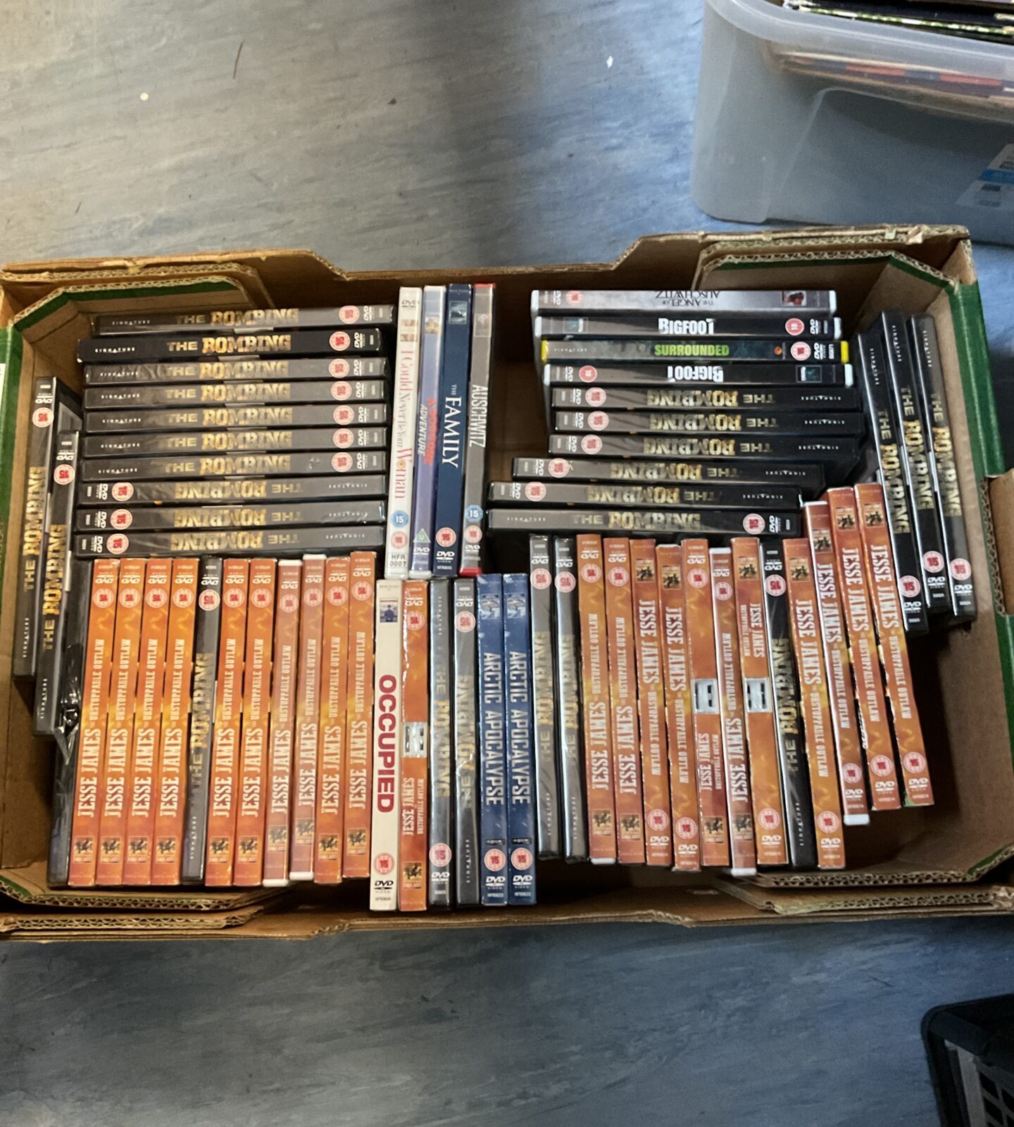 Tray of new & sealed dvds inc jesse james
