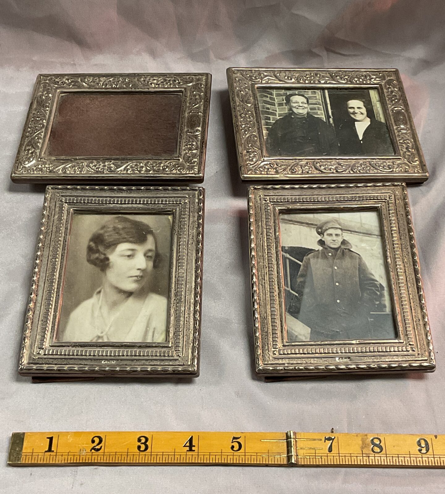 Four hallmarked silver photo frames