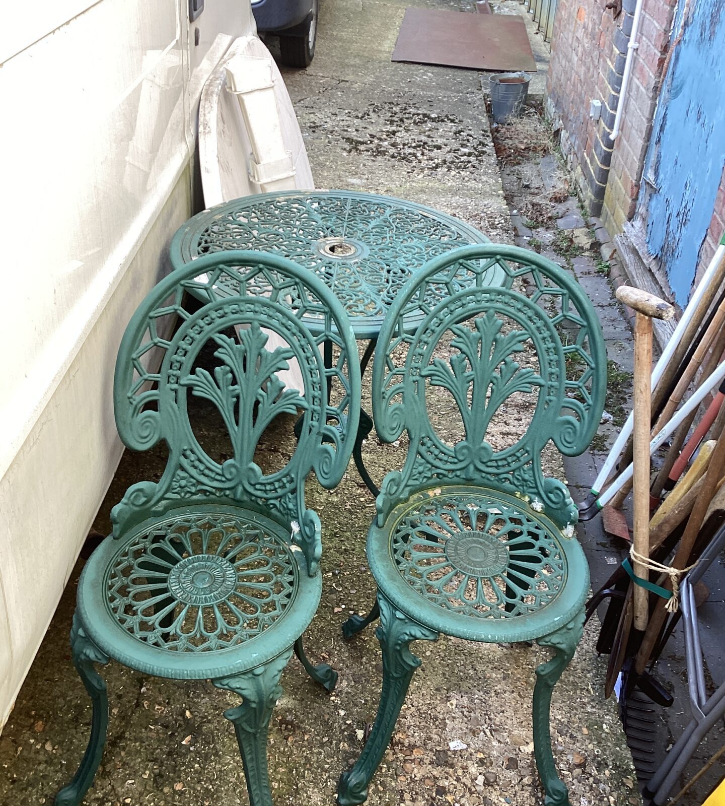 Metal patio table and two chairs