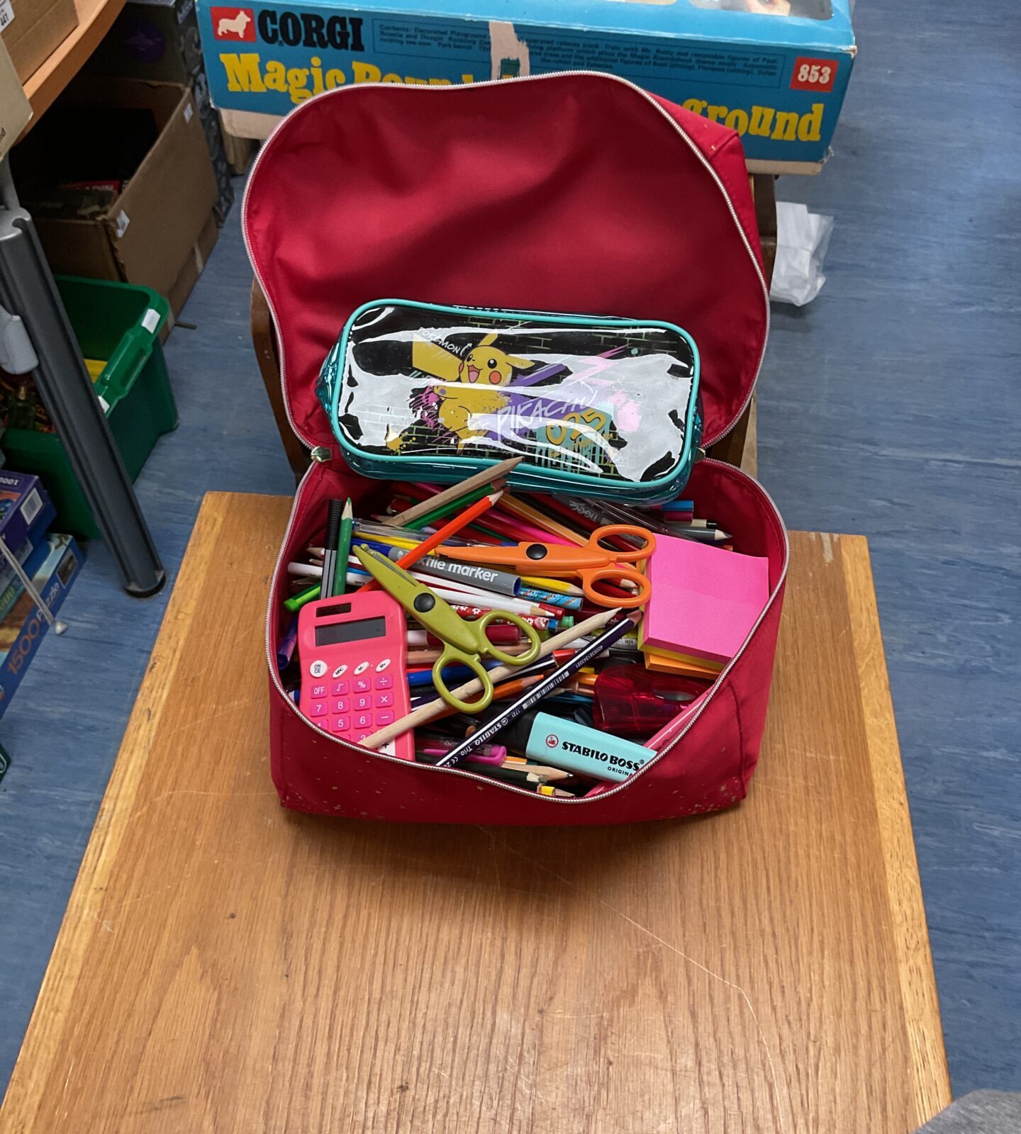 Pencil case with contents inc mini calculator, hole puncher, highlighters, pencils and more