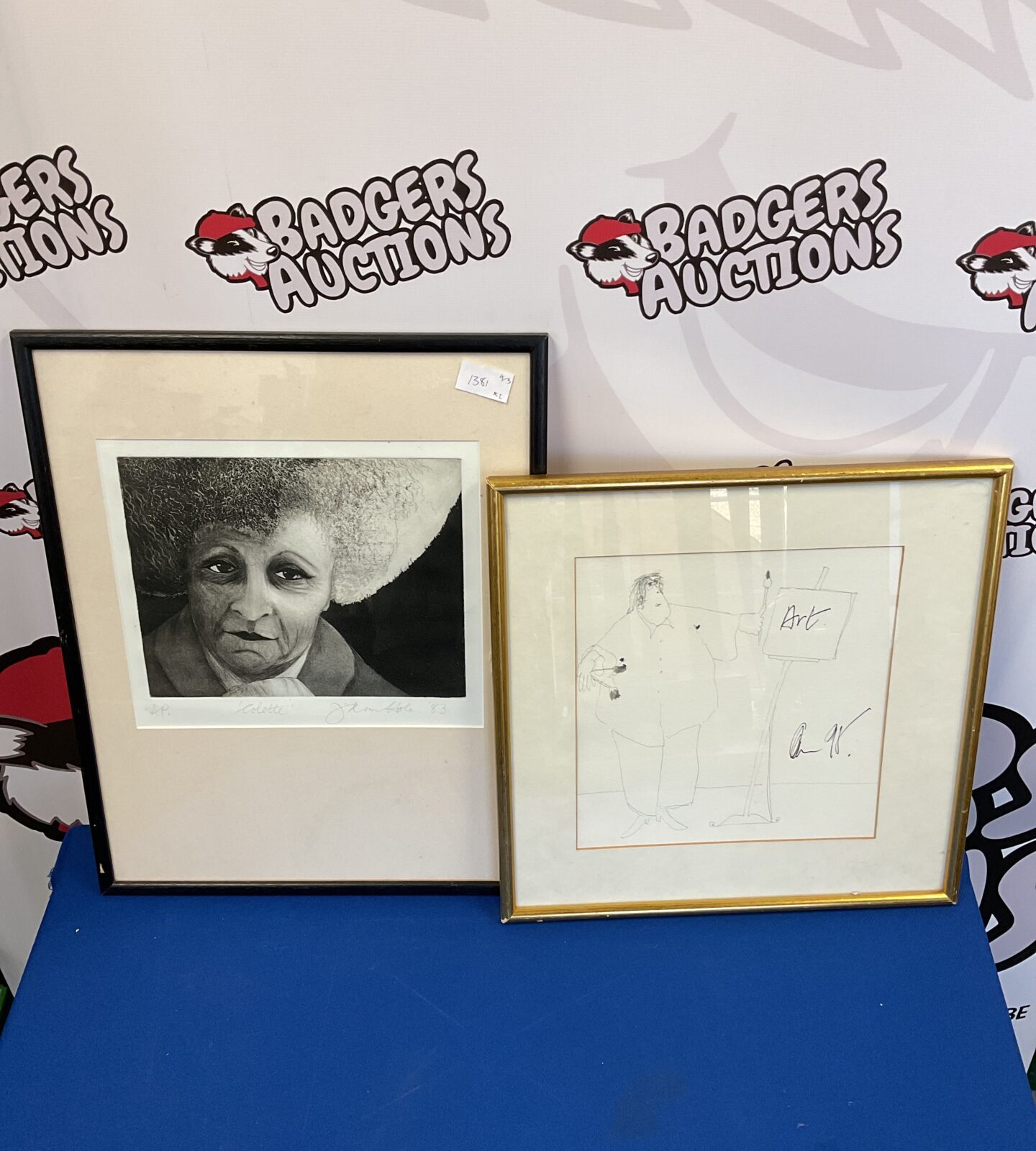 two framed signed portraits of an artist & etching of woman