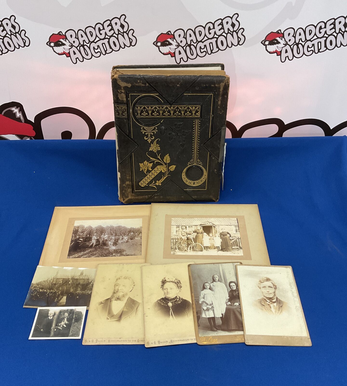 Victorian photo album with selection of photos
