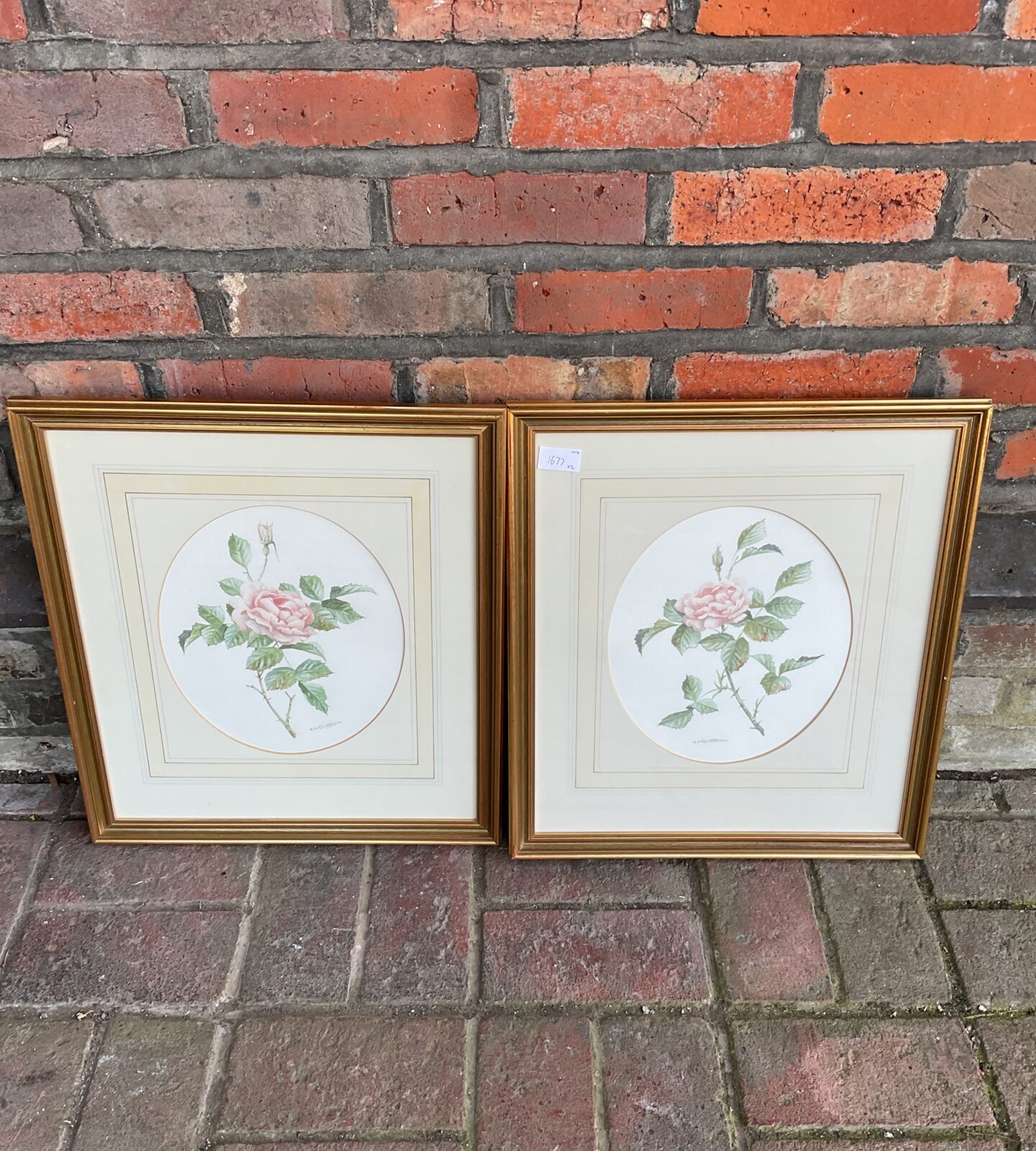 Pair of gilt framed i a gillibrant watercolours of roses