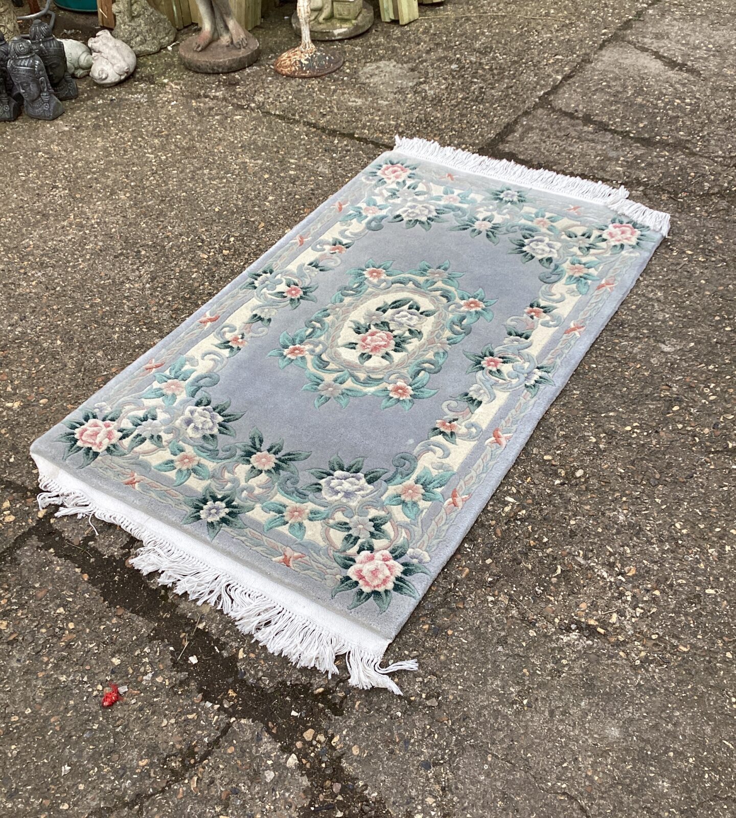 Blue floral patterned runner rug approximately 5ft x 3ft