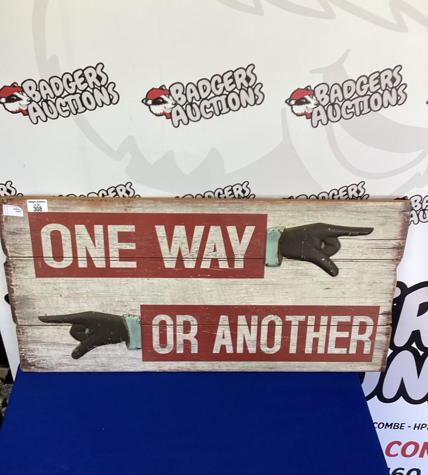 Wooden one way or another sign
