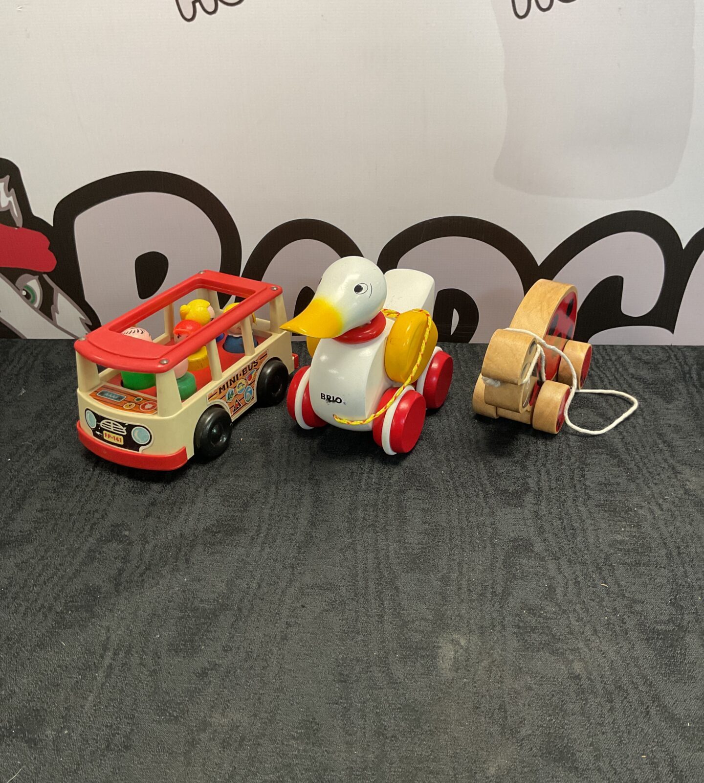 Vintage fisher price mini bus with two pull along toys inc brio duck