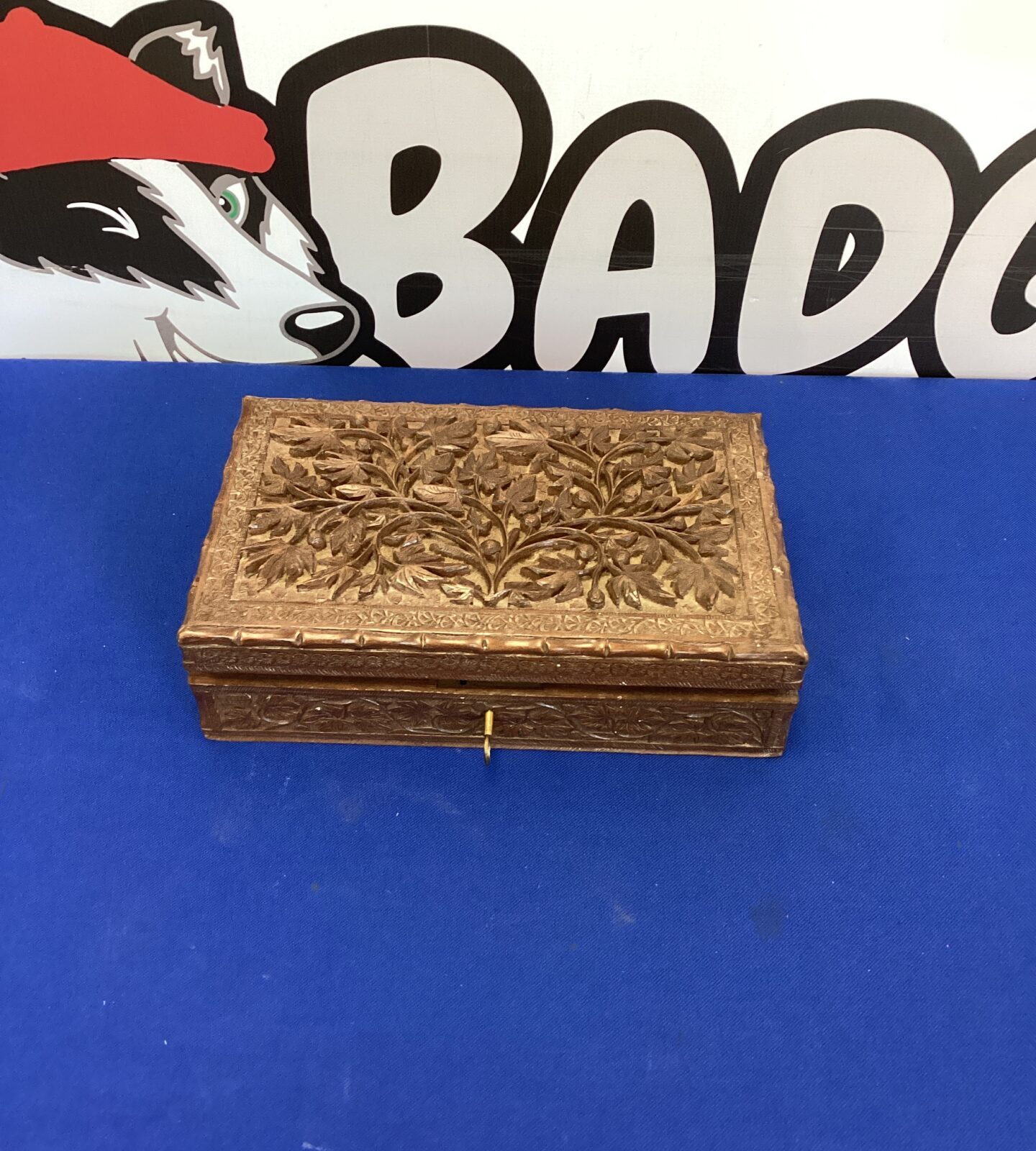 heavily carved wooden jewellery box