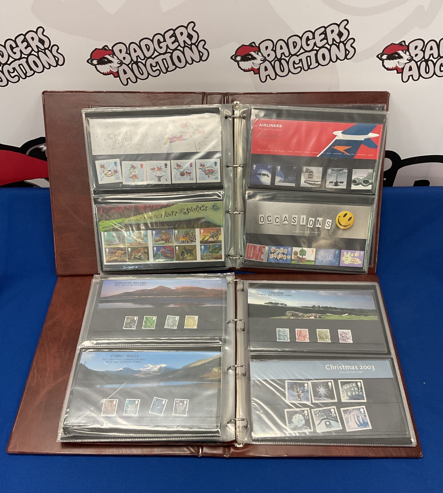 Two folders full of royal mail stamp presentation sets - Image 3