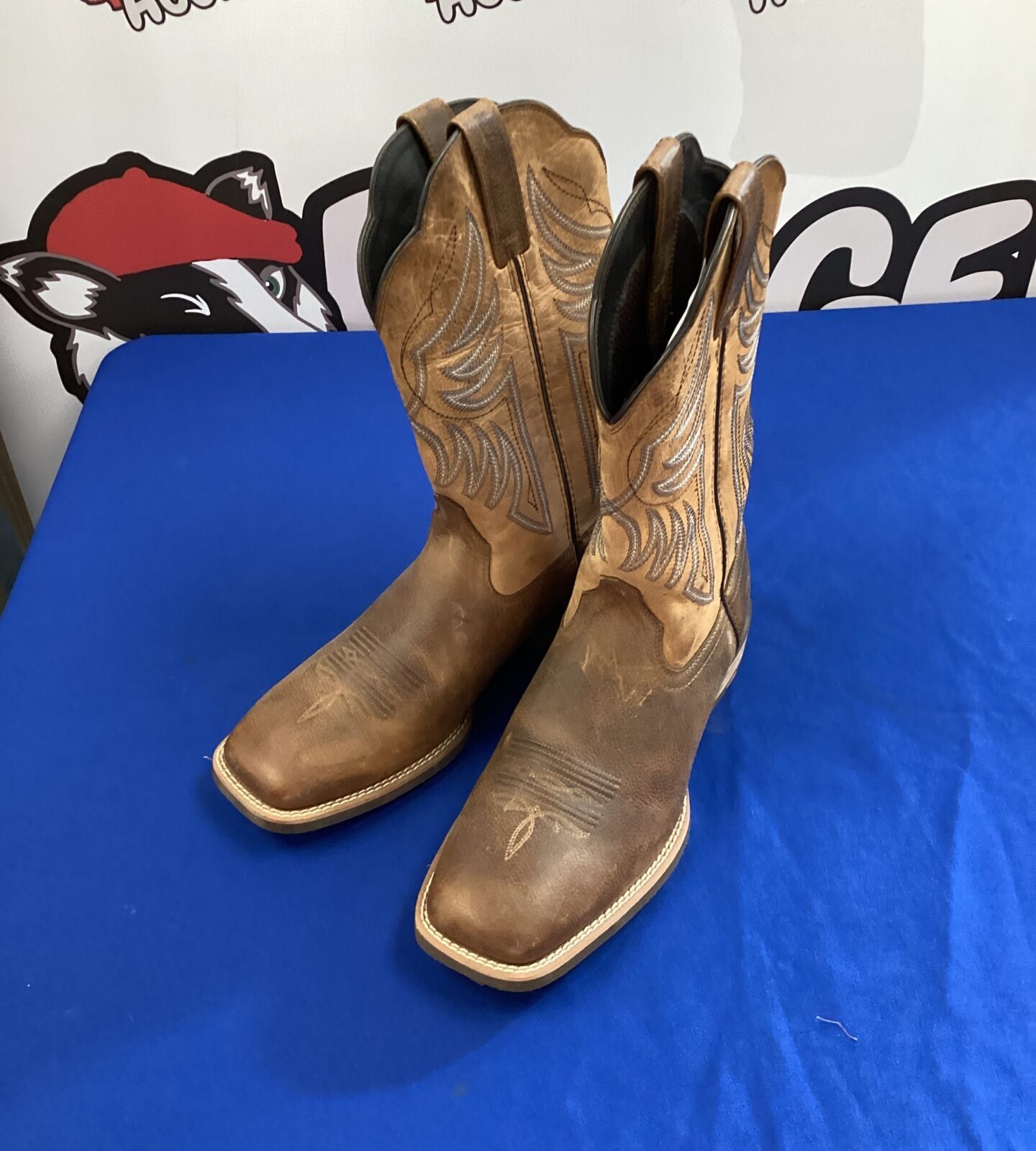 Pair of ariat cowboy style leather boots size 10