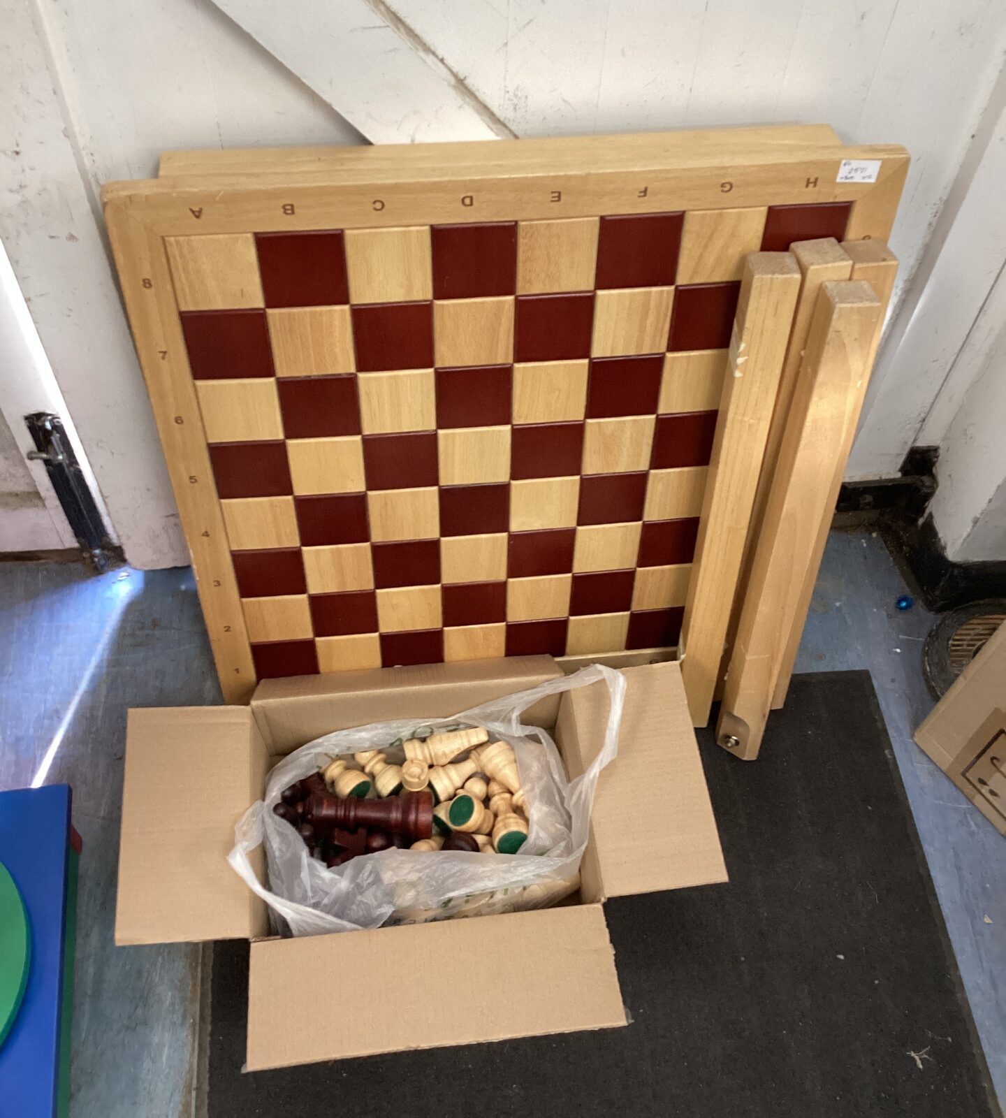 Large pine chess table with large chess pieces