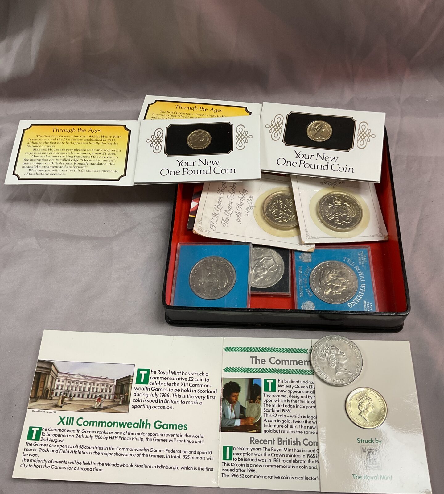 Box of assorted commemorative coins Inc £5 and £2 Commonwealth games