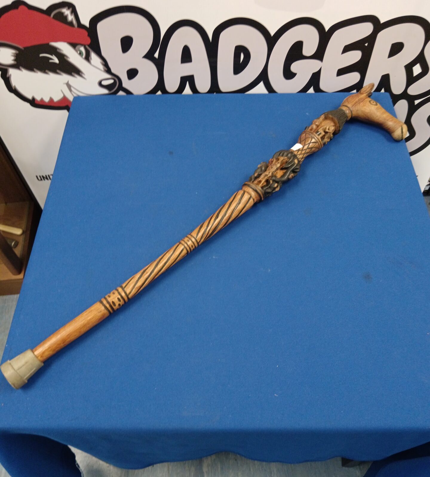 Hand carved African walking stick adorned with animals