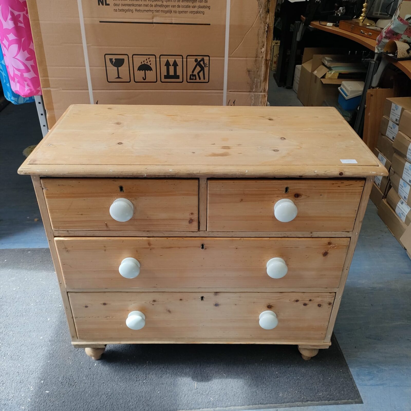 Two over two pine chest of drawers