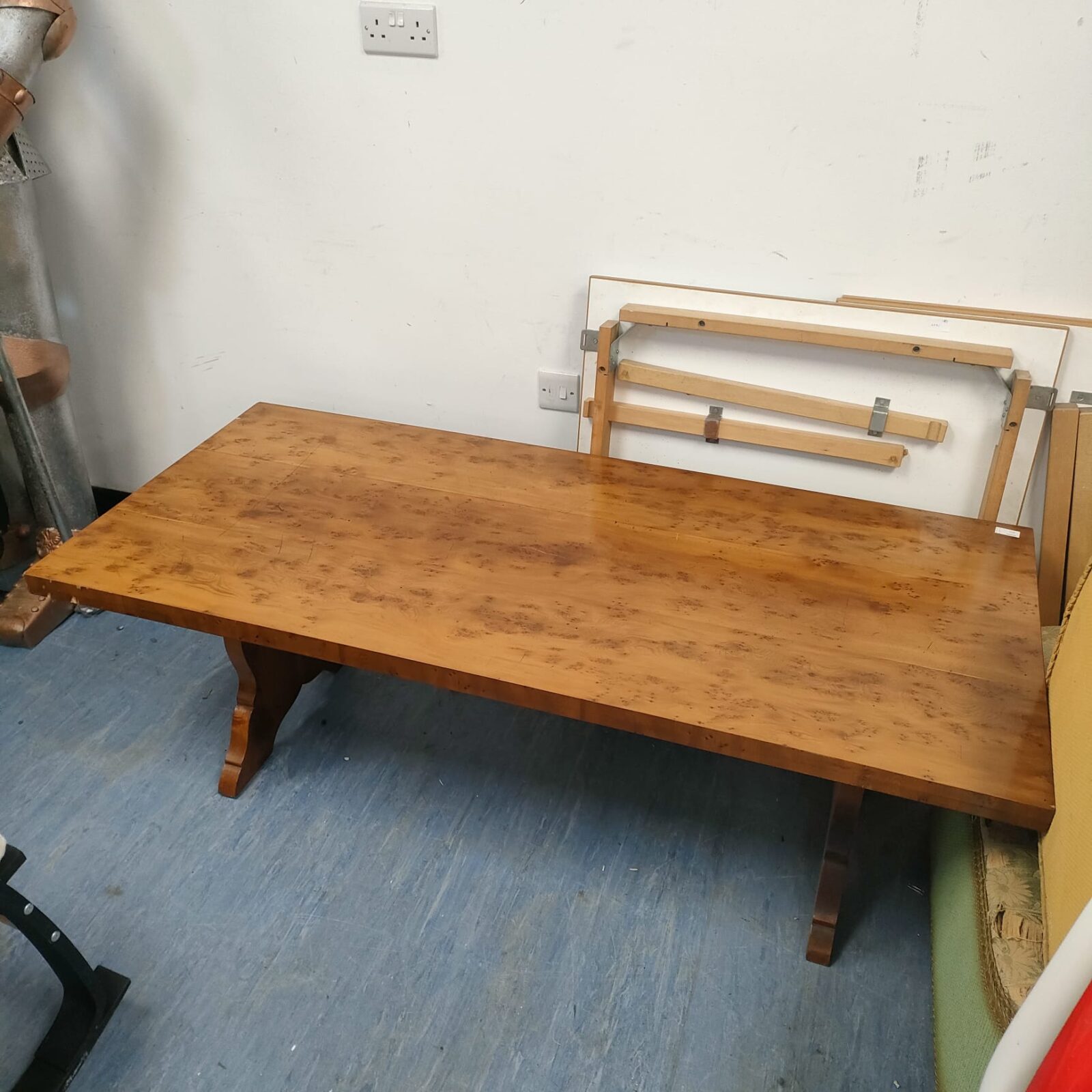 Reproduction walnut coffee table with lion head motif on ends