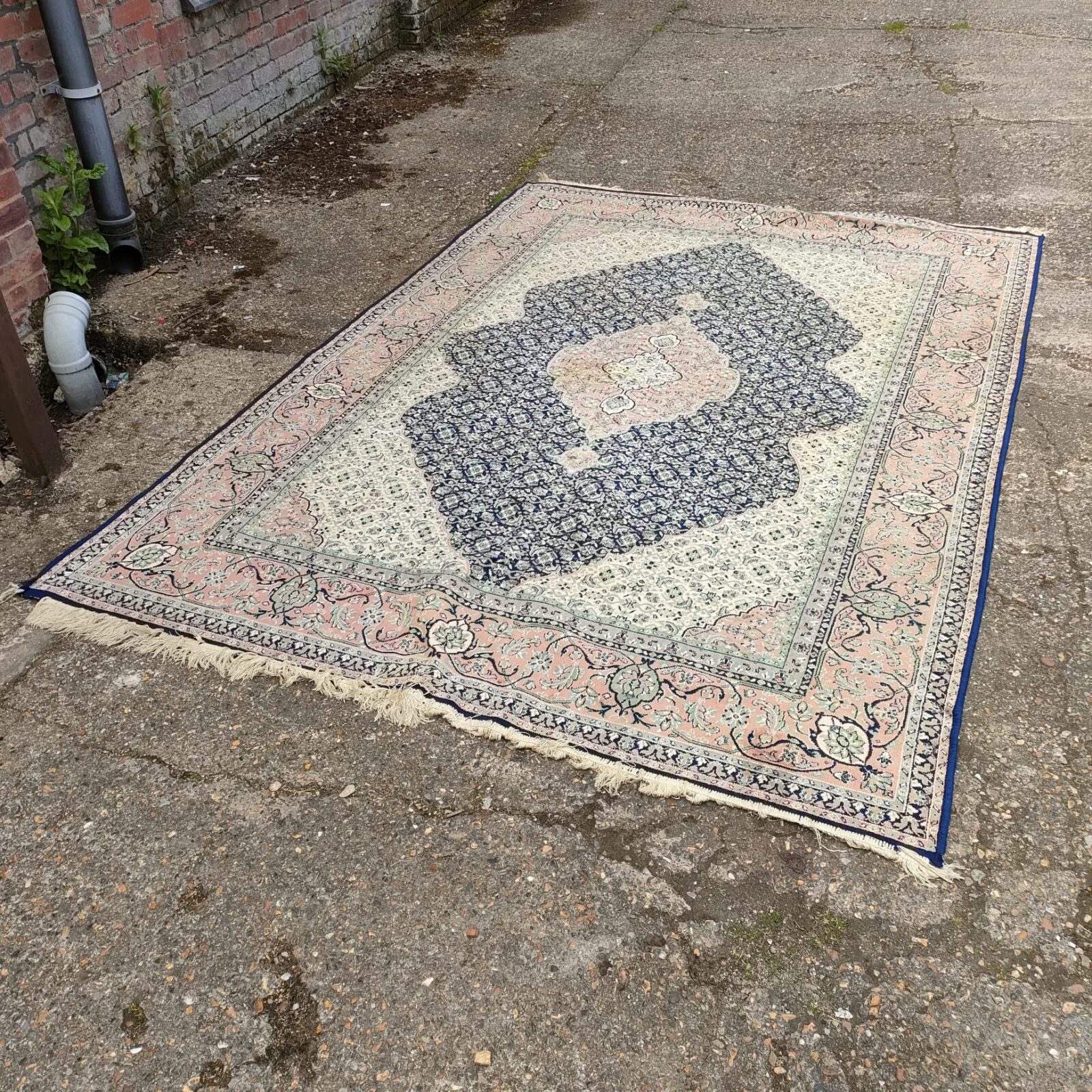 Large blue floral patterned rug