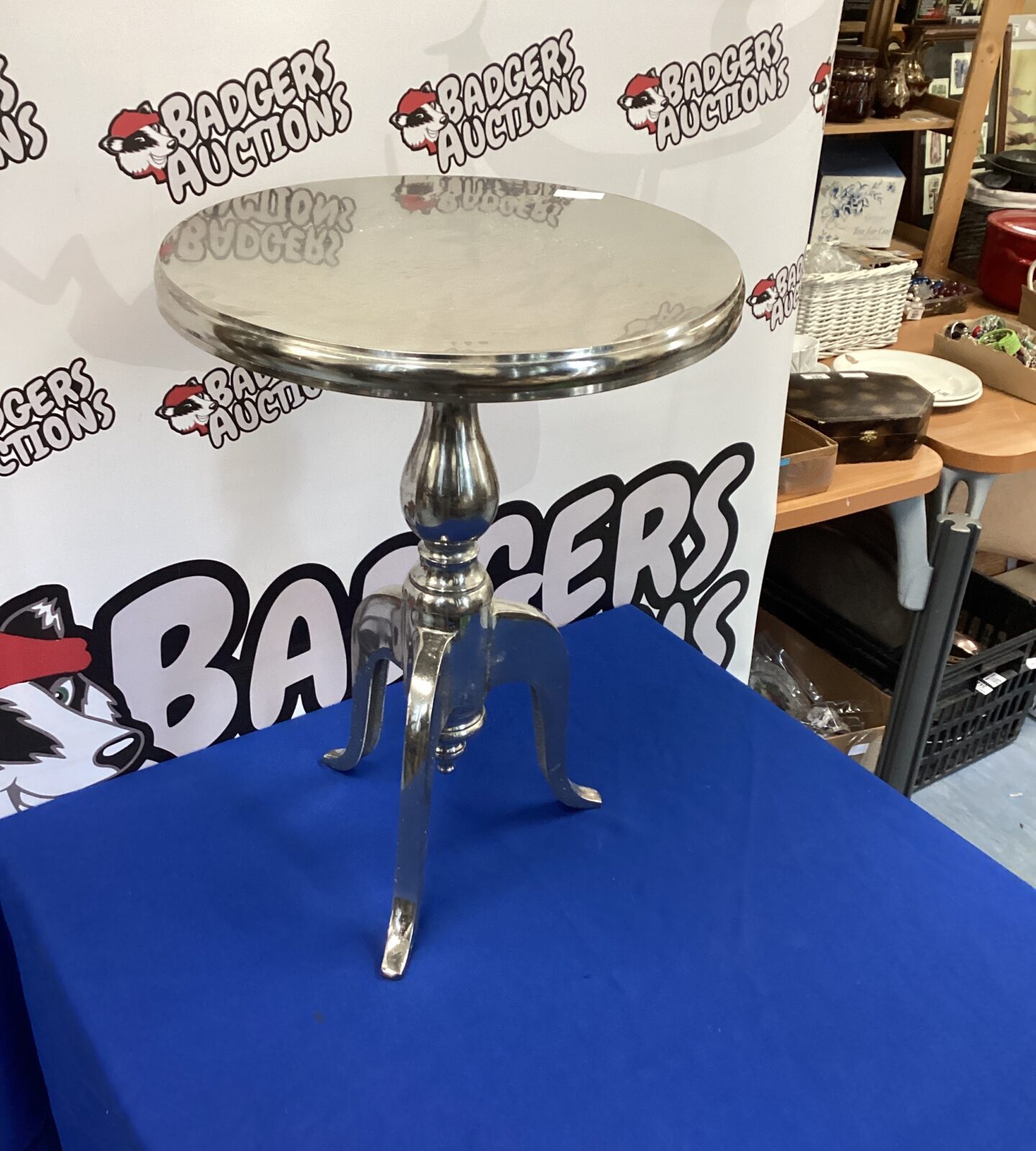 Stainless steel three legged wine table