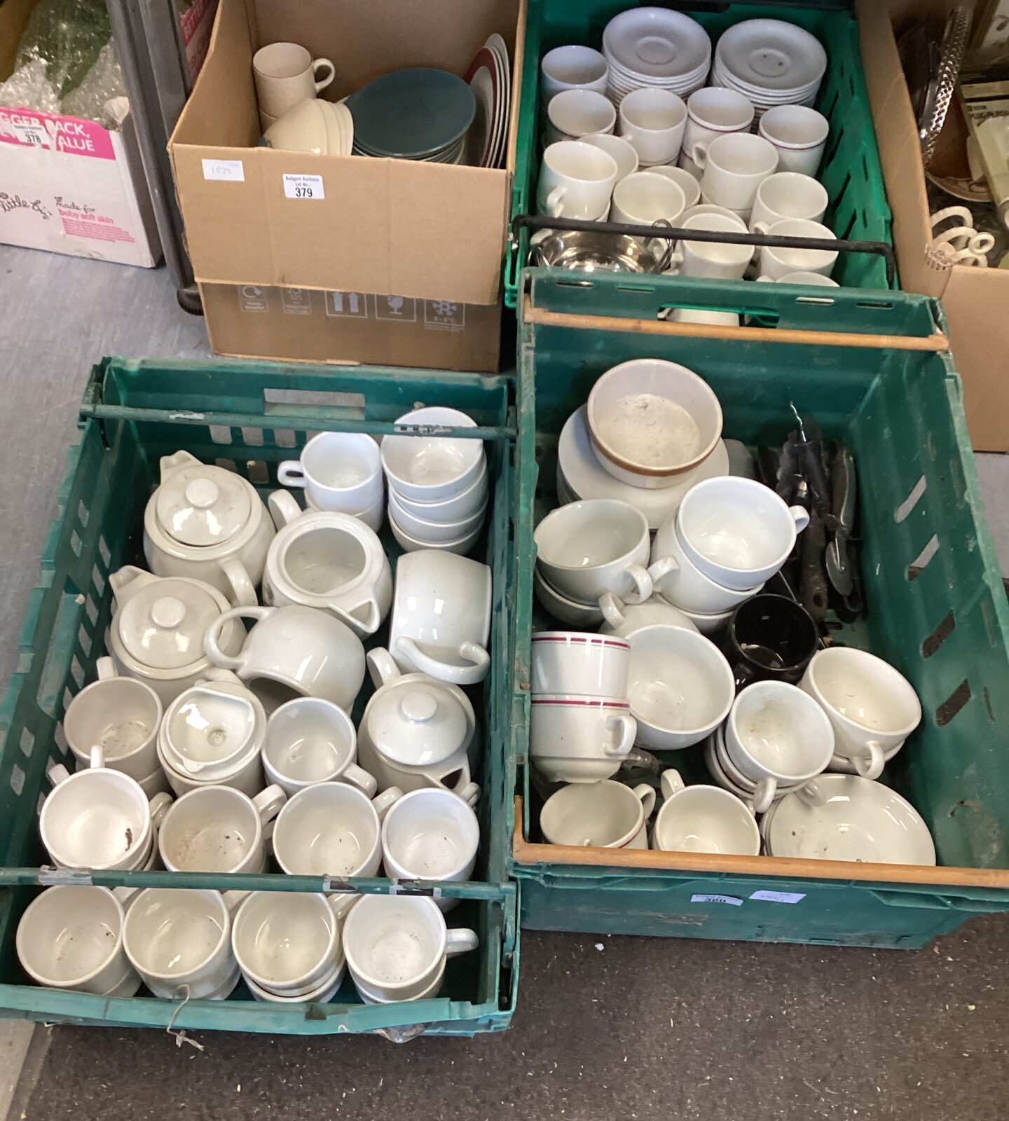 Three trays of white commercial coffee and tea cups etc