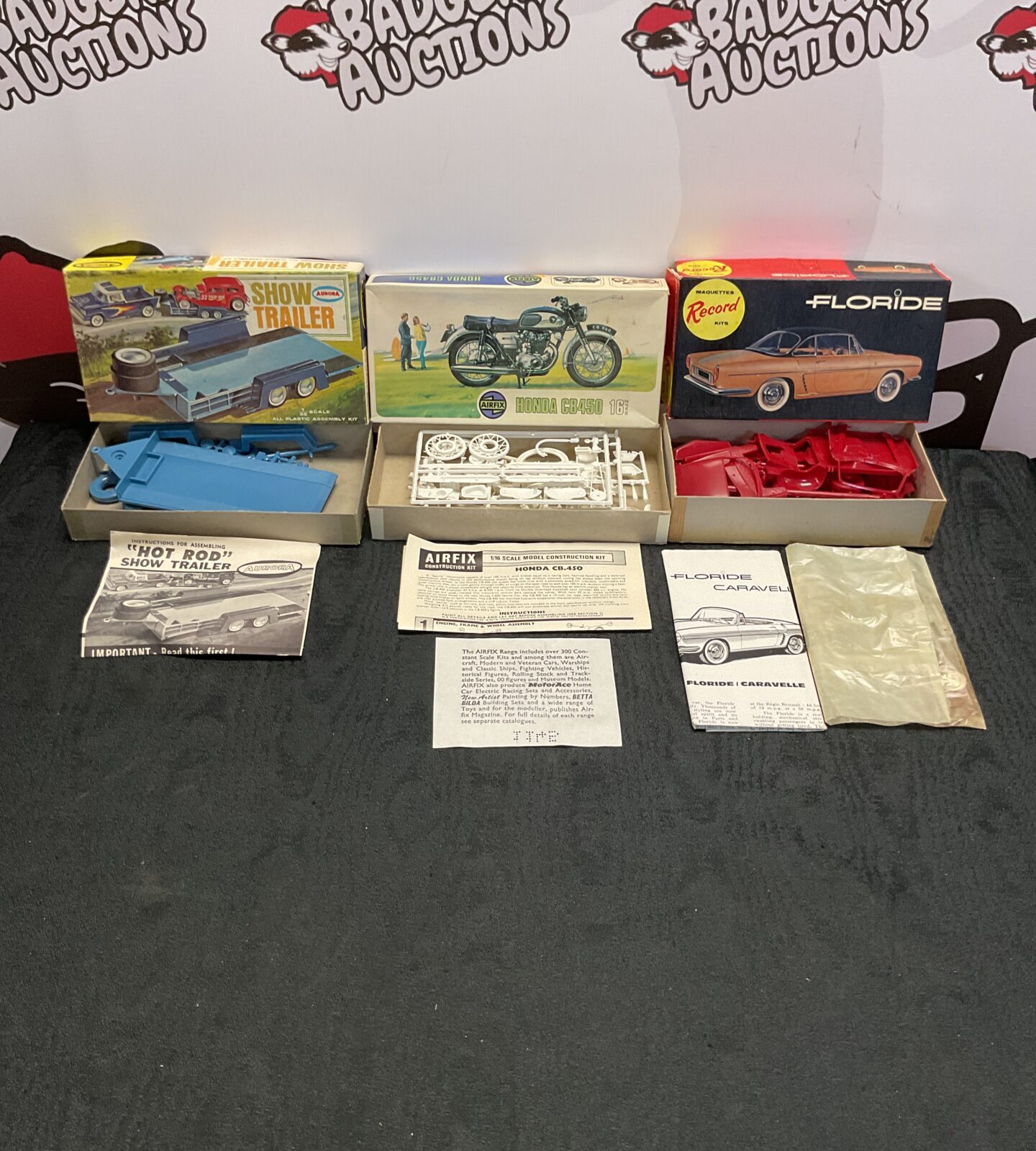 Three vintage boxed model kits inc airfix honda cb450 16, aurora show trailer and maquettes floride