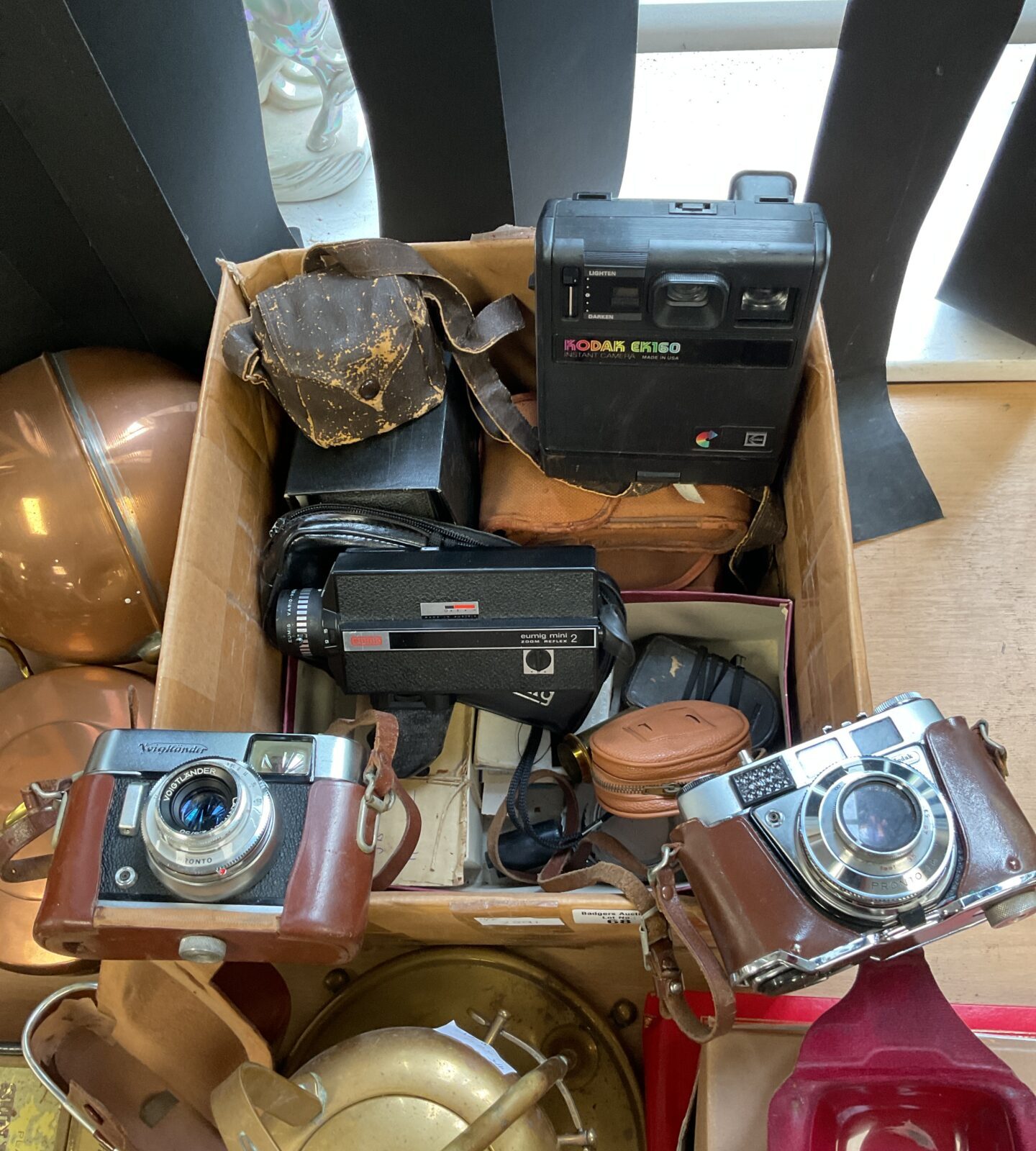 Box of vintage cameras including kodak & eumig