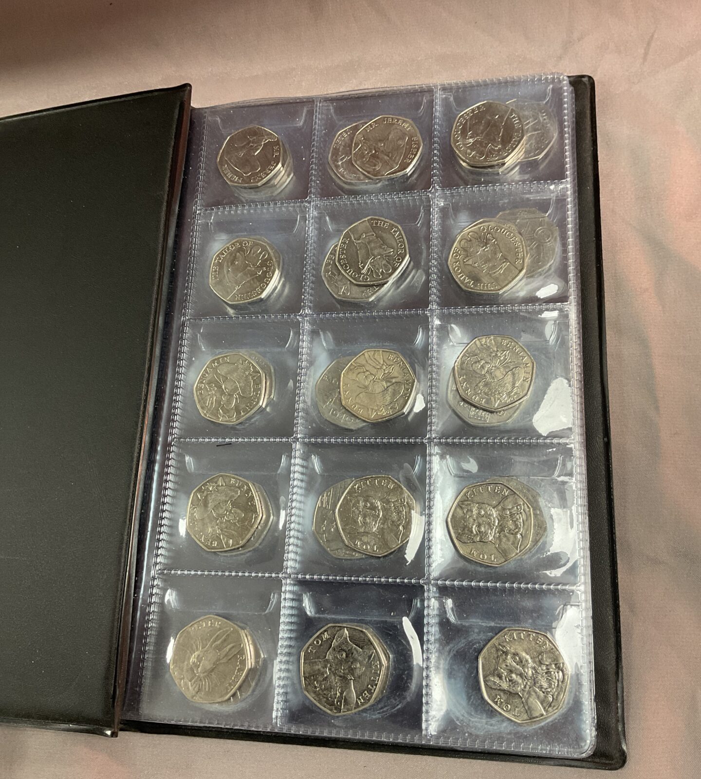 A Coin folder of 39 Commemorative 50p coins Inc Beatrix potter