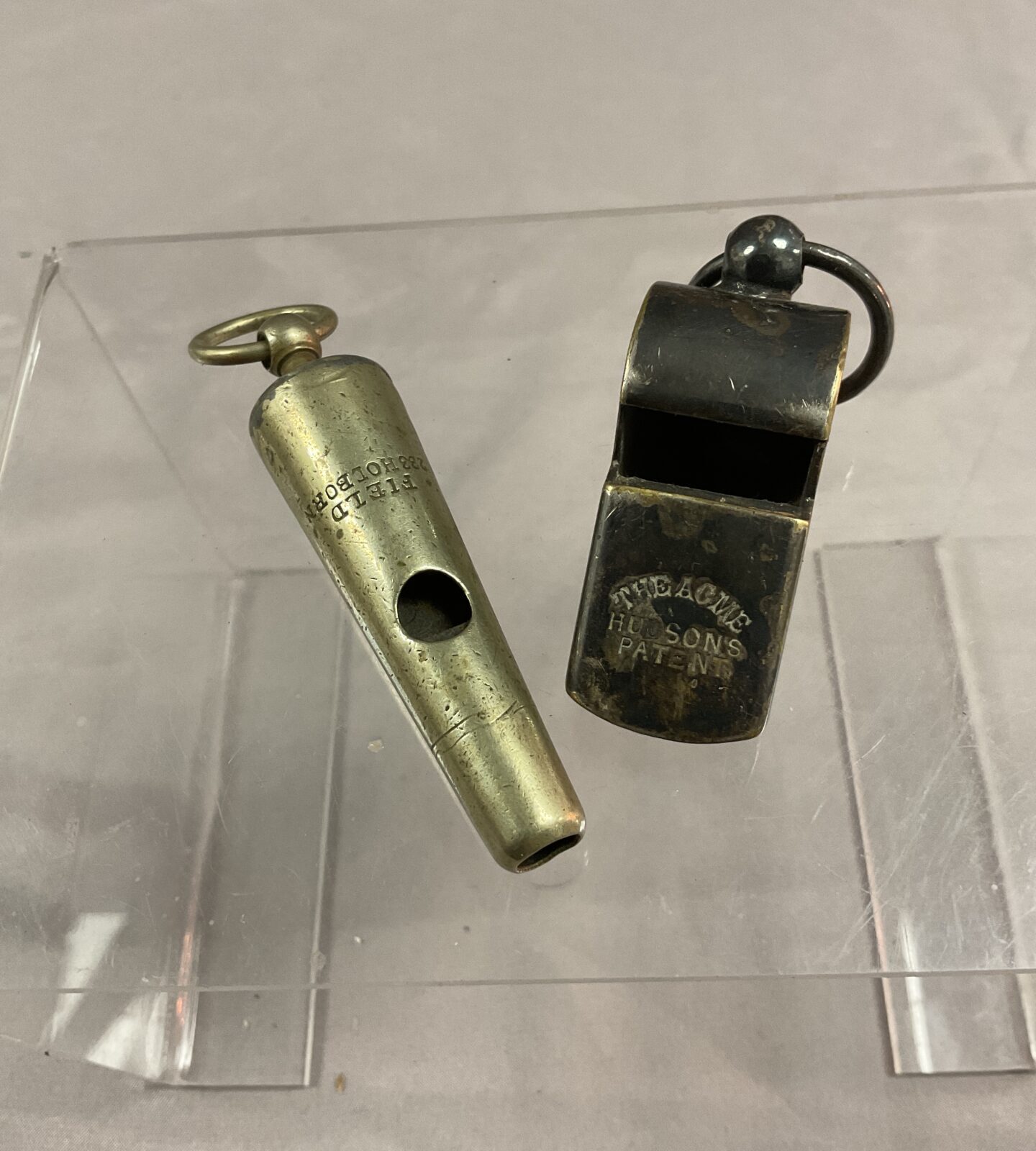 Two vintage whistles field 233 Holborn and the acme hudsons