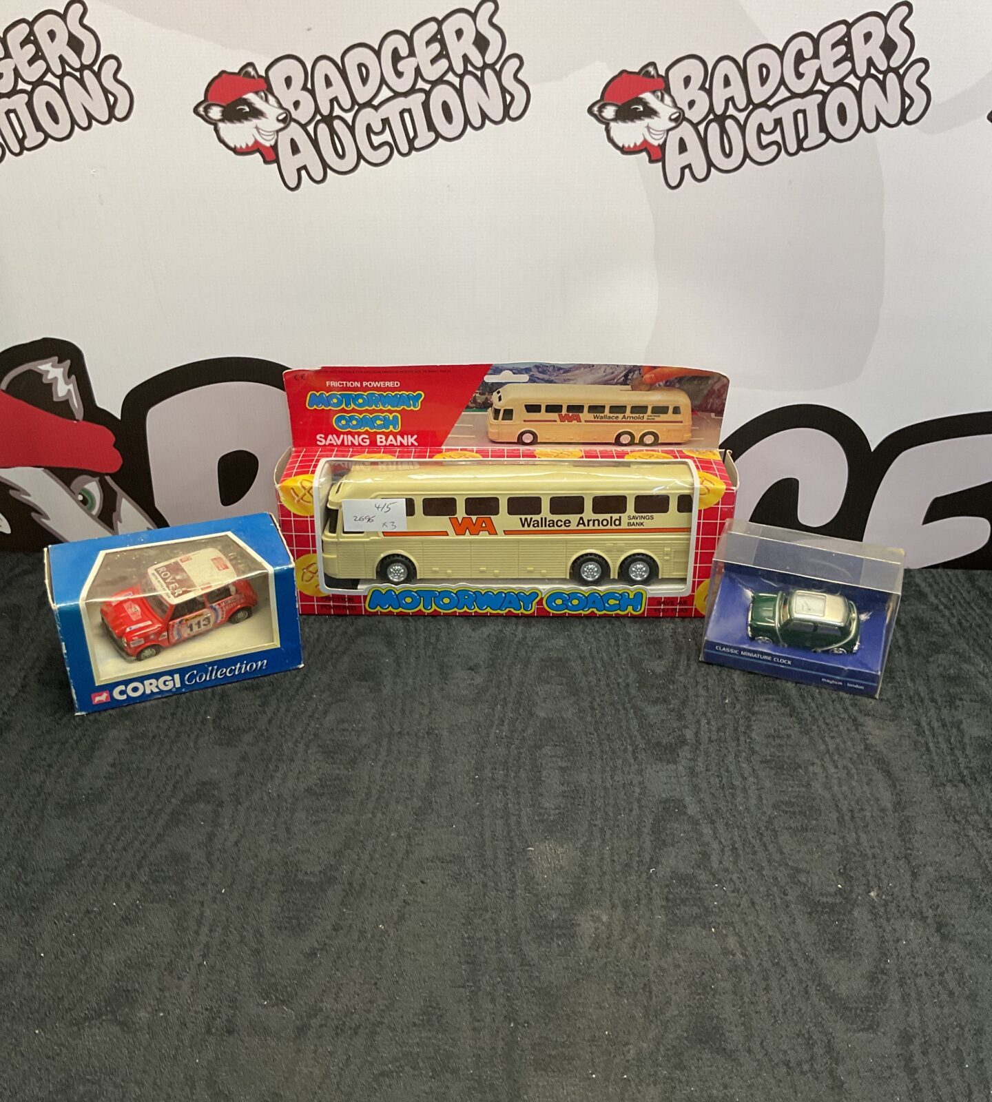 Three boxed models inc corgi and motorway coach