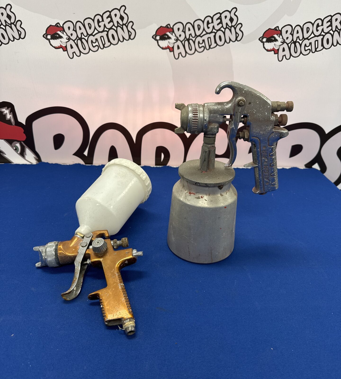 Two paint spray guns inc align air