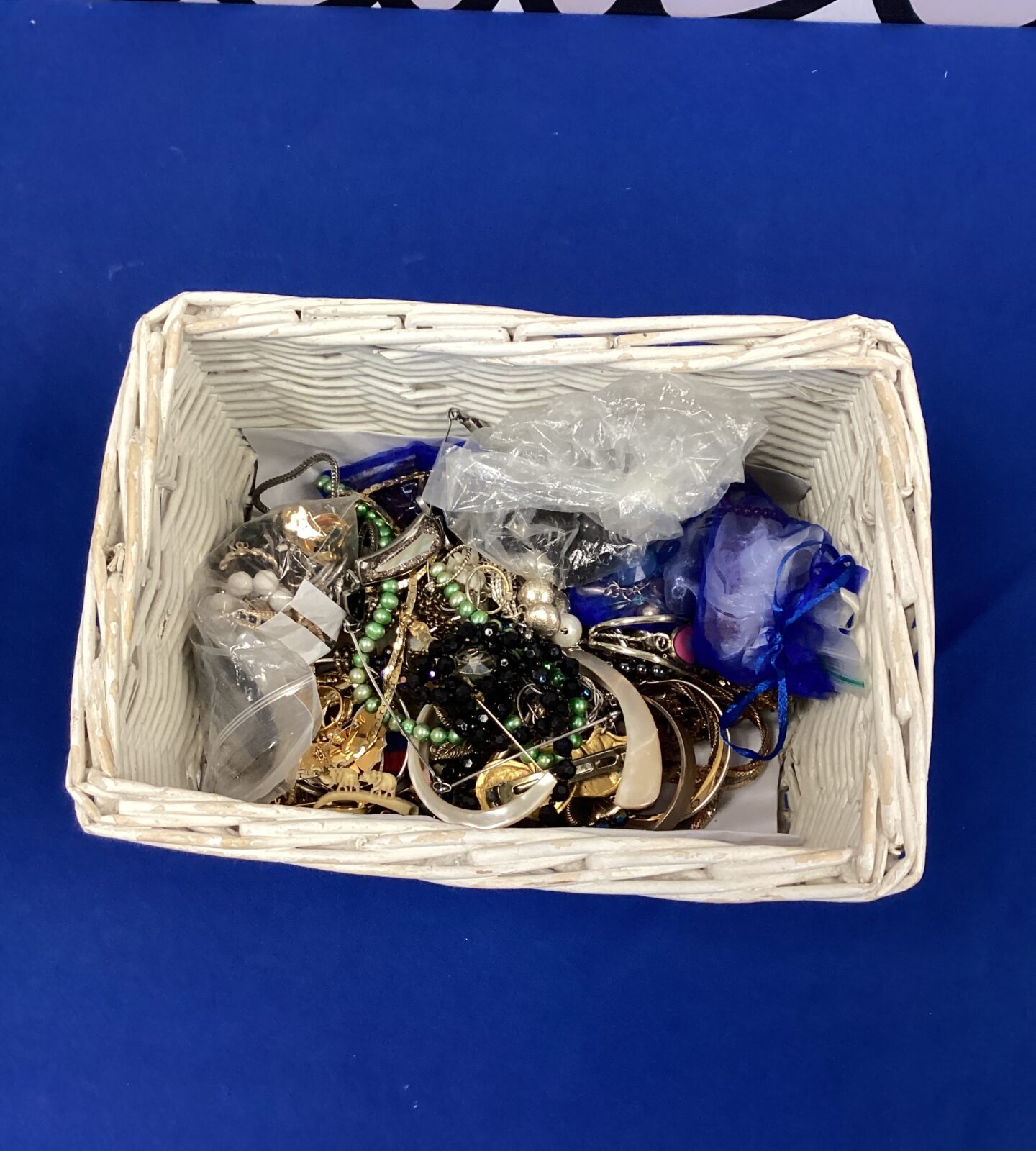 Basket of costume jewellery