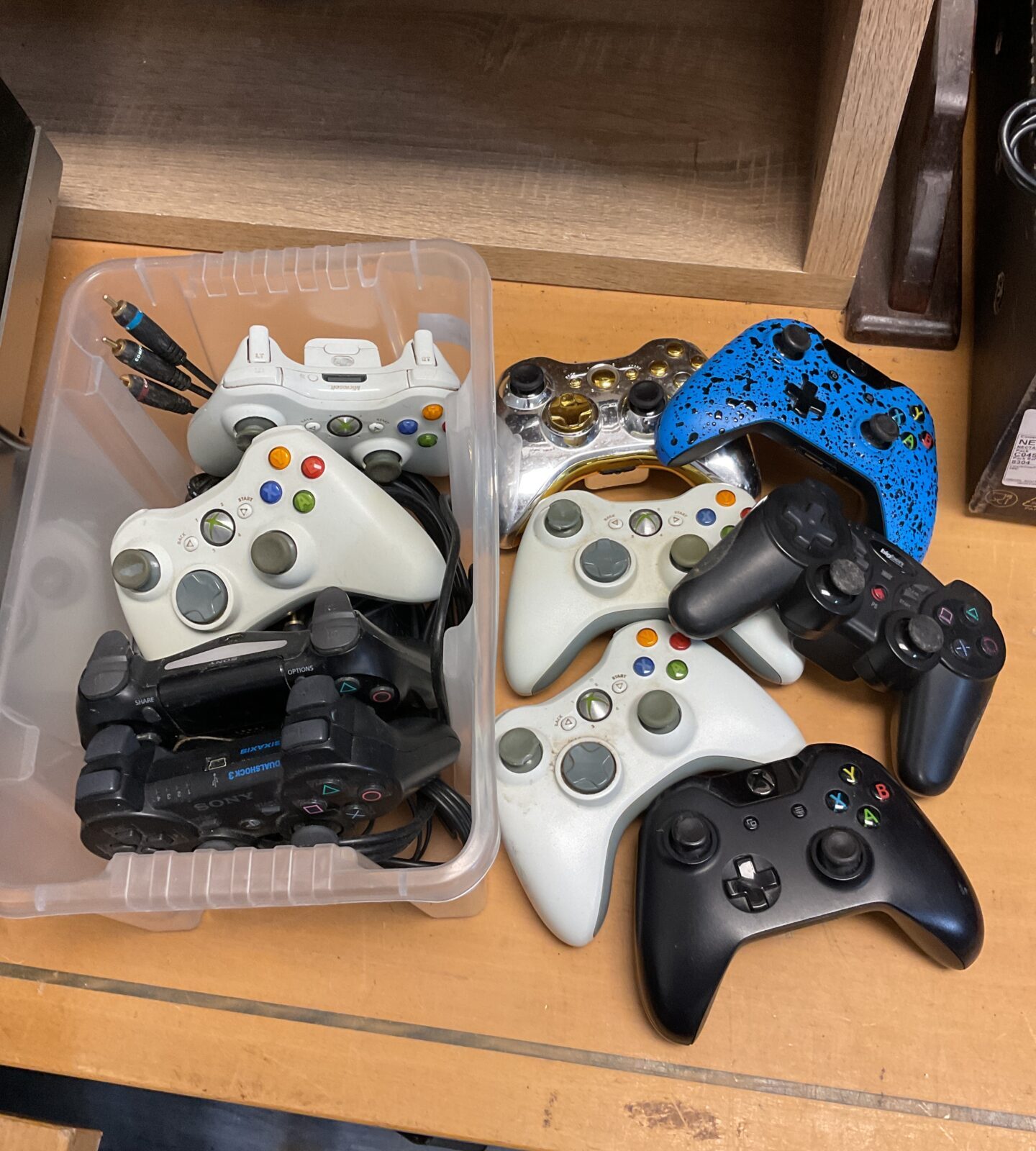 Box of gaming controllers inc microsoft xbox 360 & sony ps3