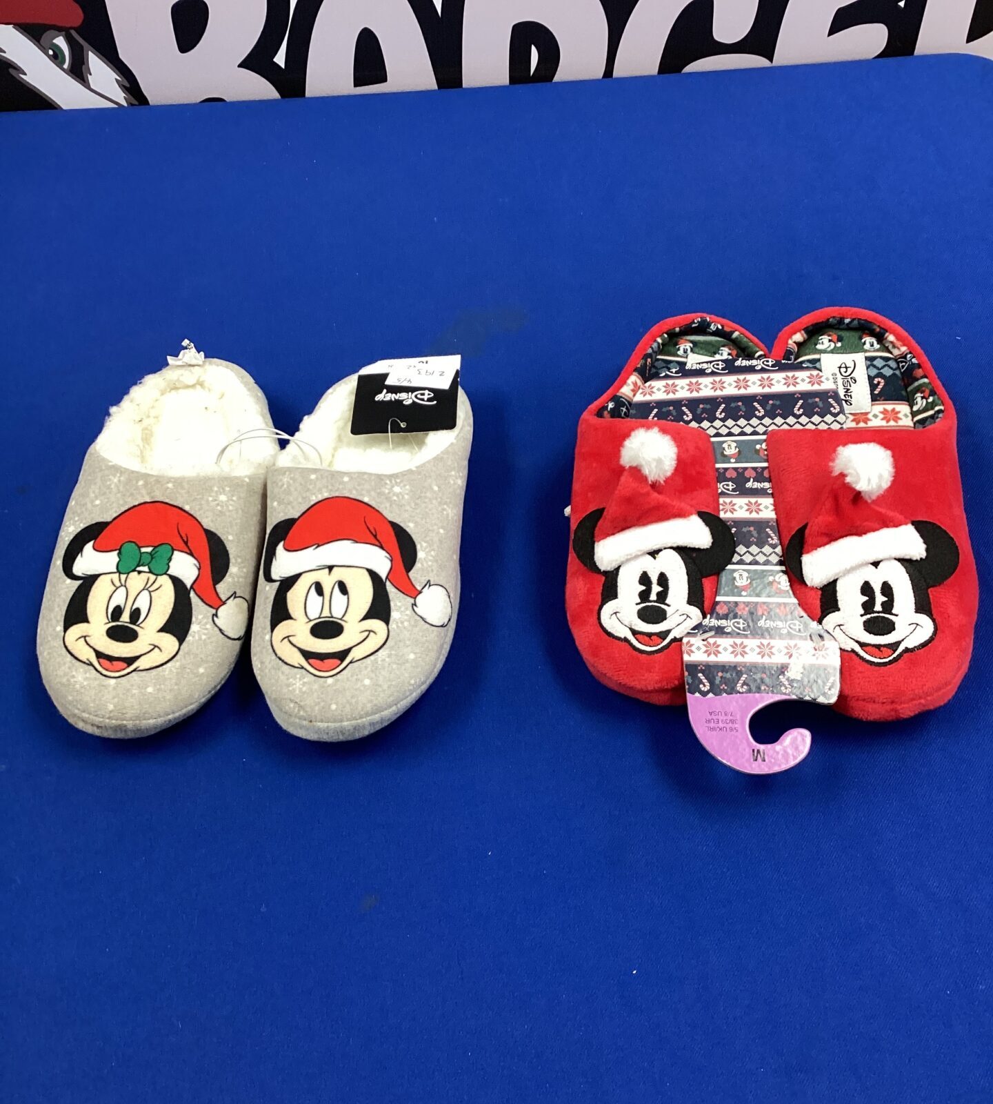 Two new pair of mickey mouse slippers sizes 5 & small