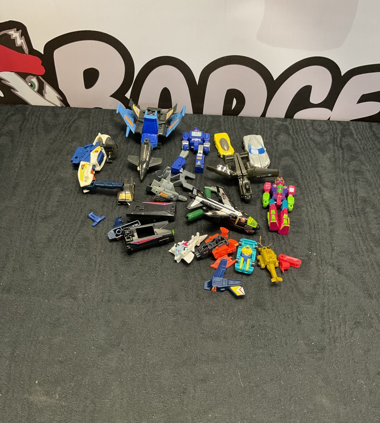 Box of vintage transformer toys