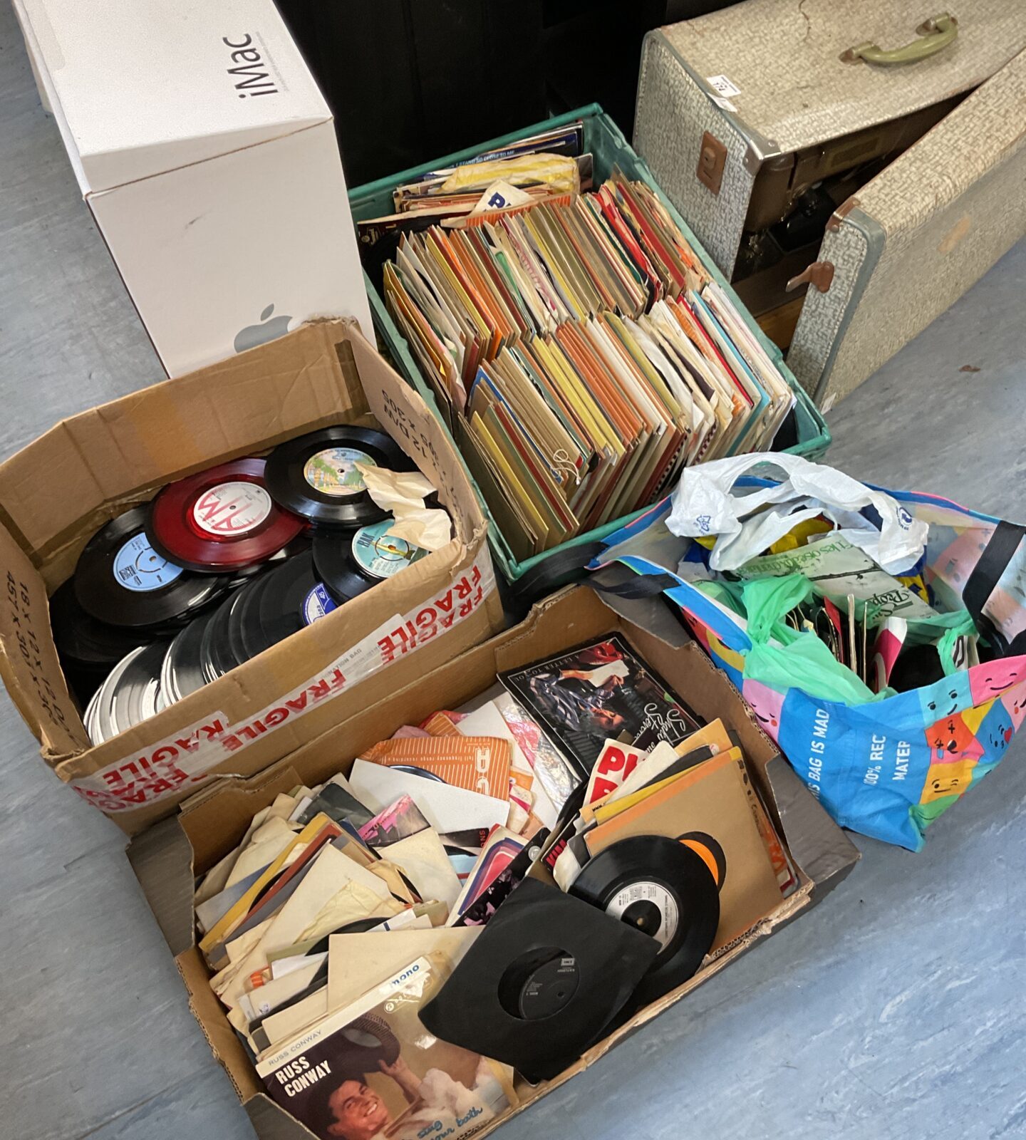 Three boxes & bag of 7” single vinyl records