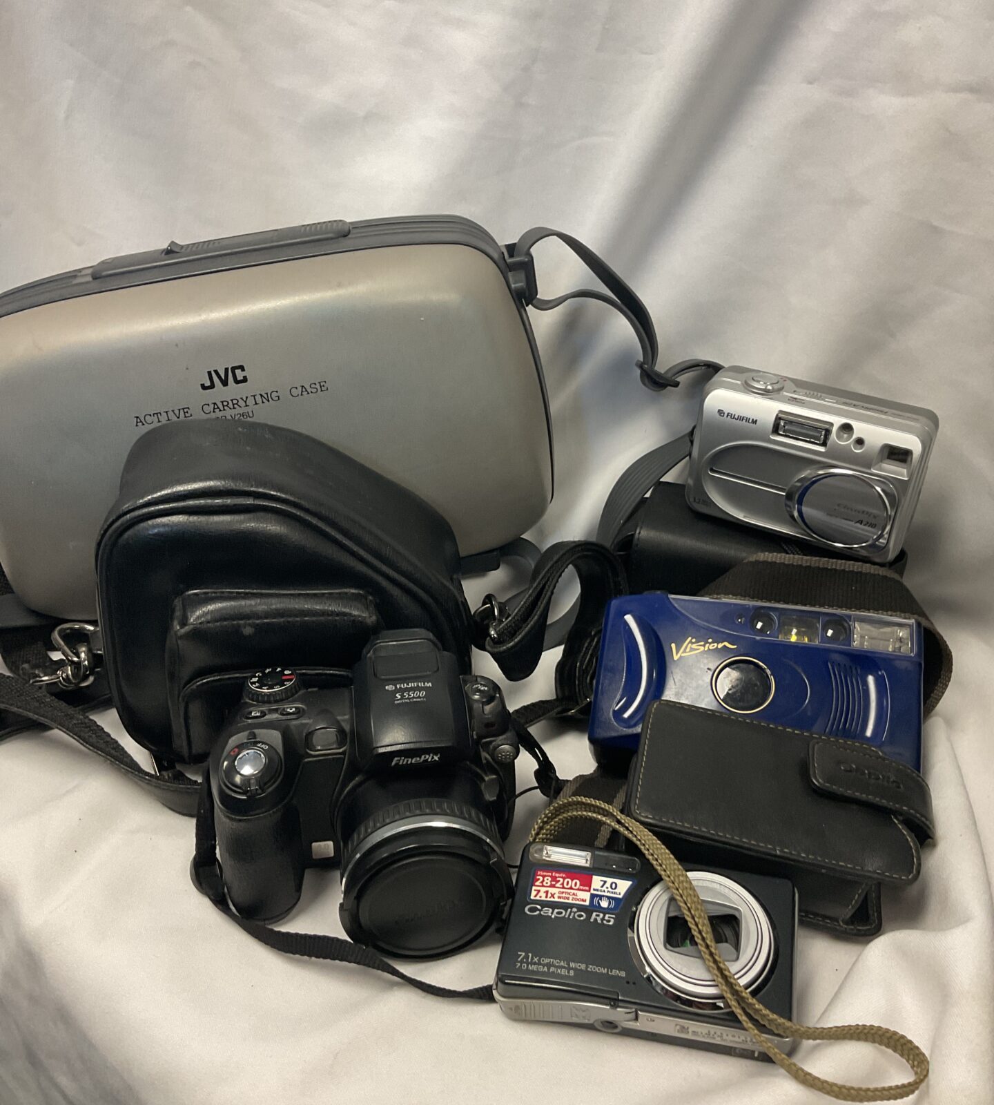 Tray of cameras including fujifilm s5500