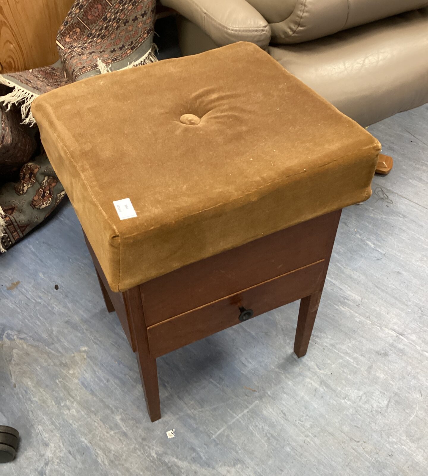 Vintage sewing stool with contents