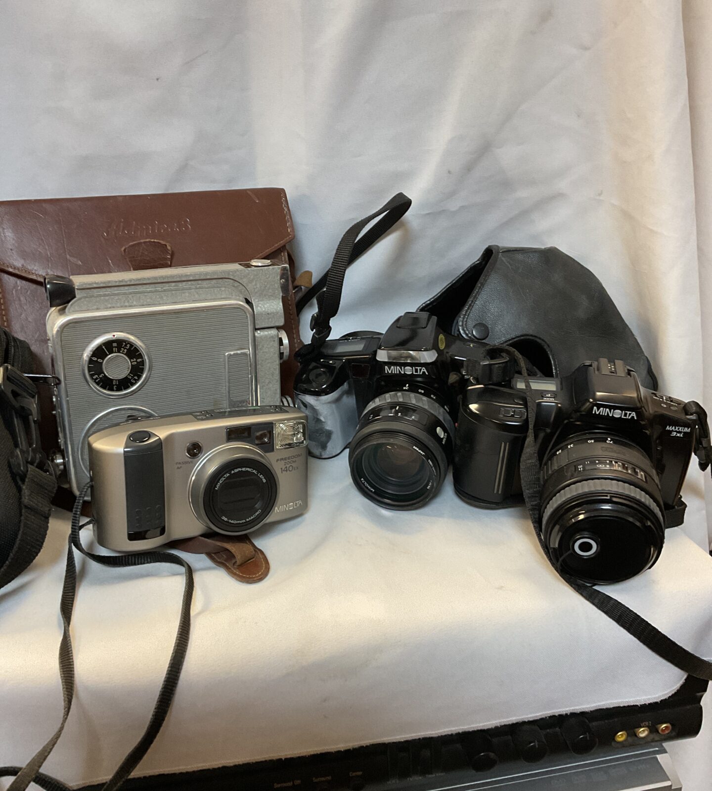 Four vintage cameras inc minolta maxcum 3xi & dynax 5000i