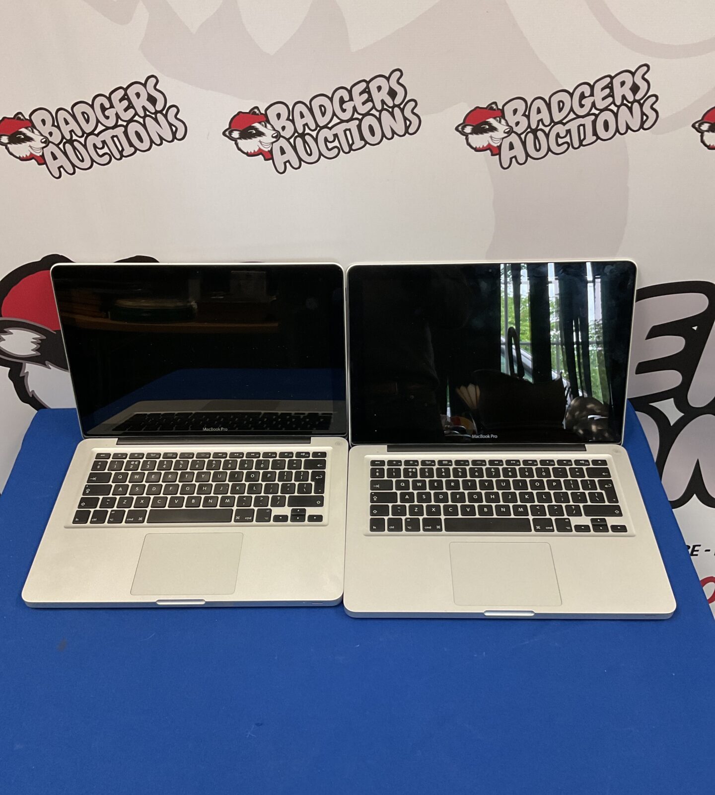 Two apple macbook pro laptops